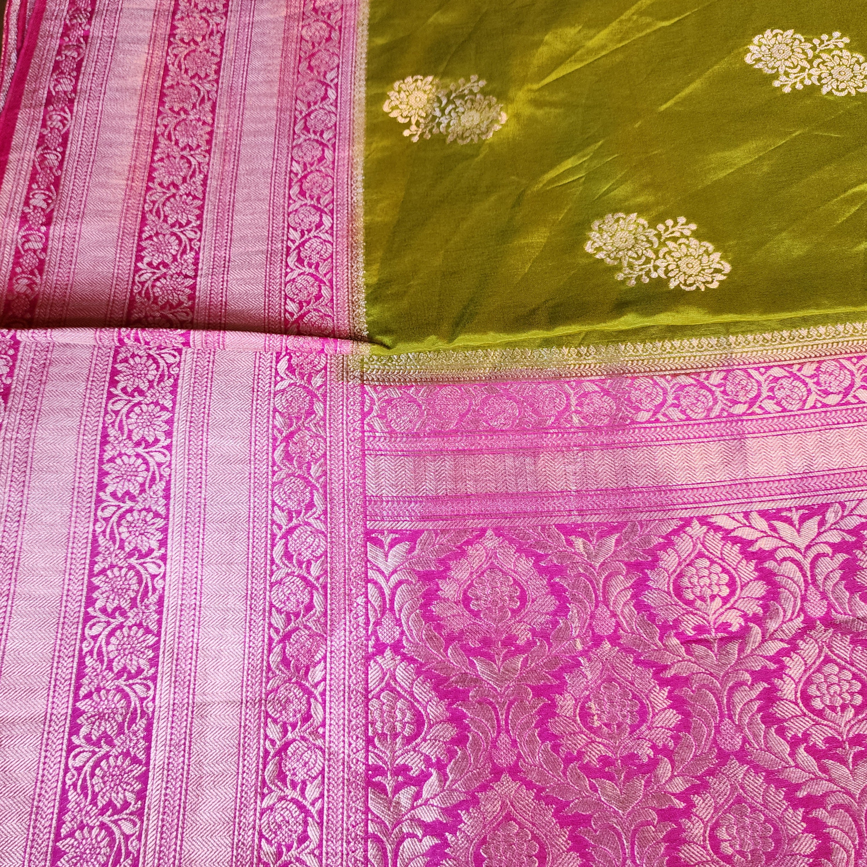 Olive Green Muslin Silk Saree with Traditional Silver Zari Work