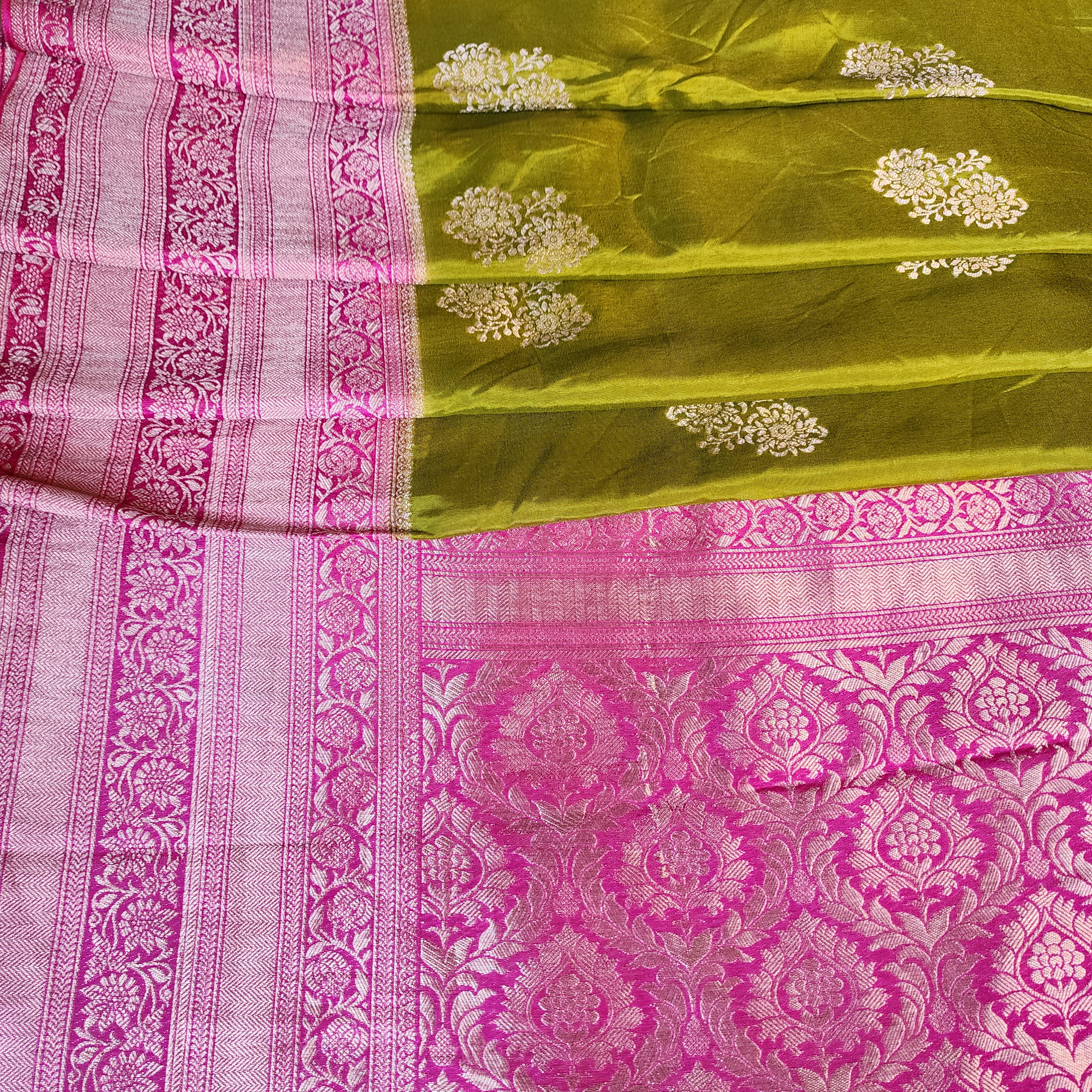 Olive Green Muslin Silk Saree with Traditional Silver Zari Work