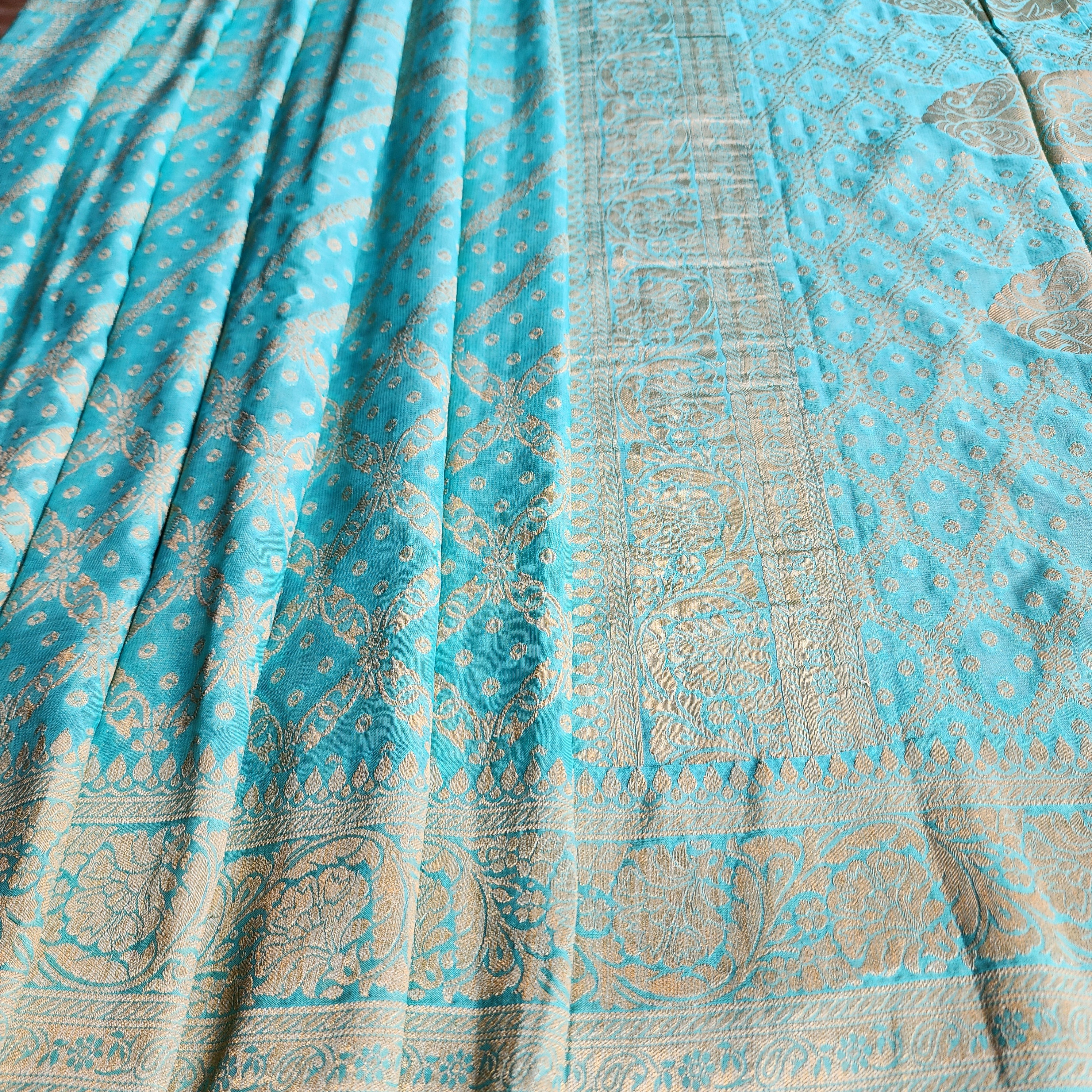 Turquoise Pure Khaddi Georgette Banarasi Saree with Golden Zari