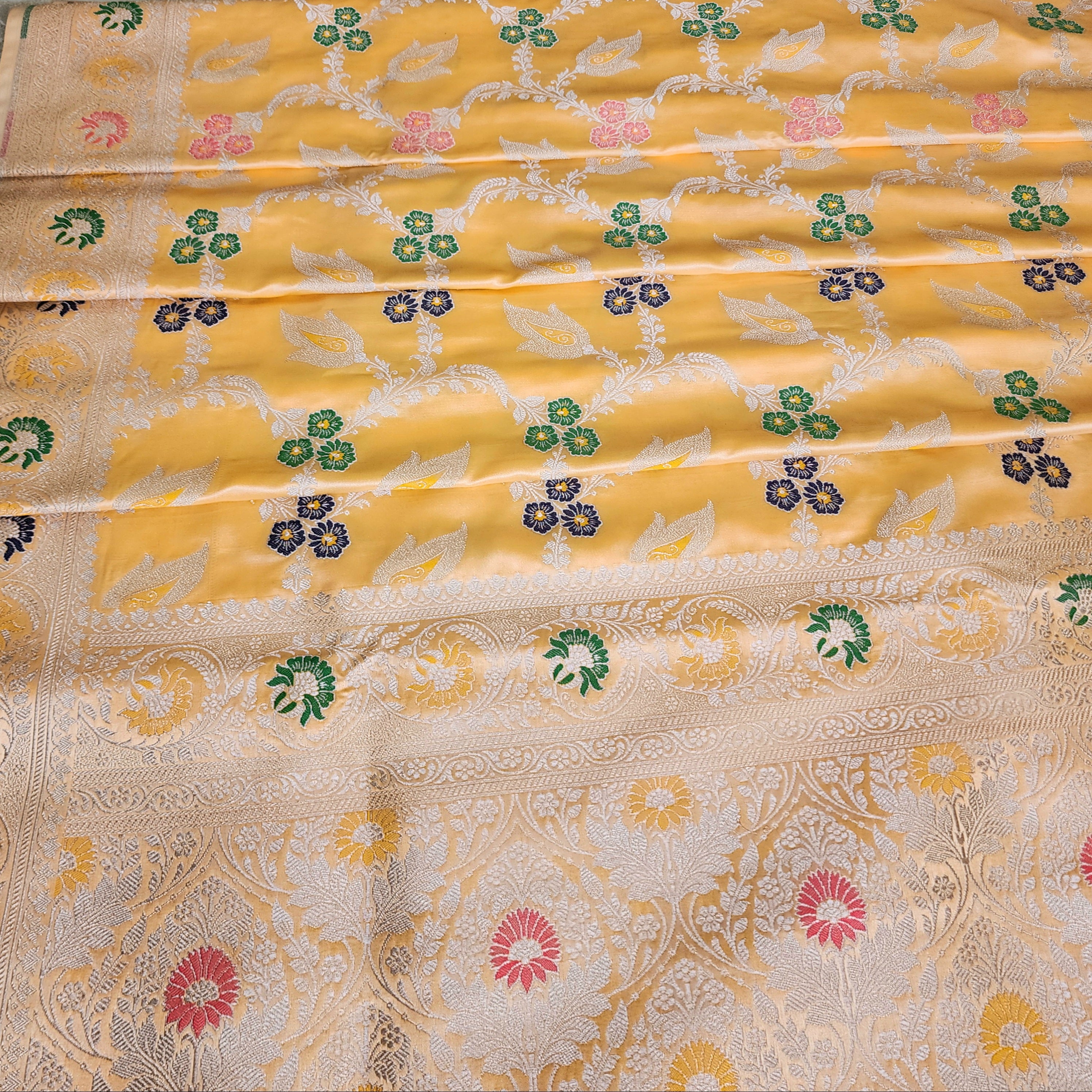 Enriched Light Orange Banarasi Katan Silk Saree with Multicolor Meenakari Floral Jaal