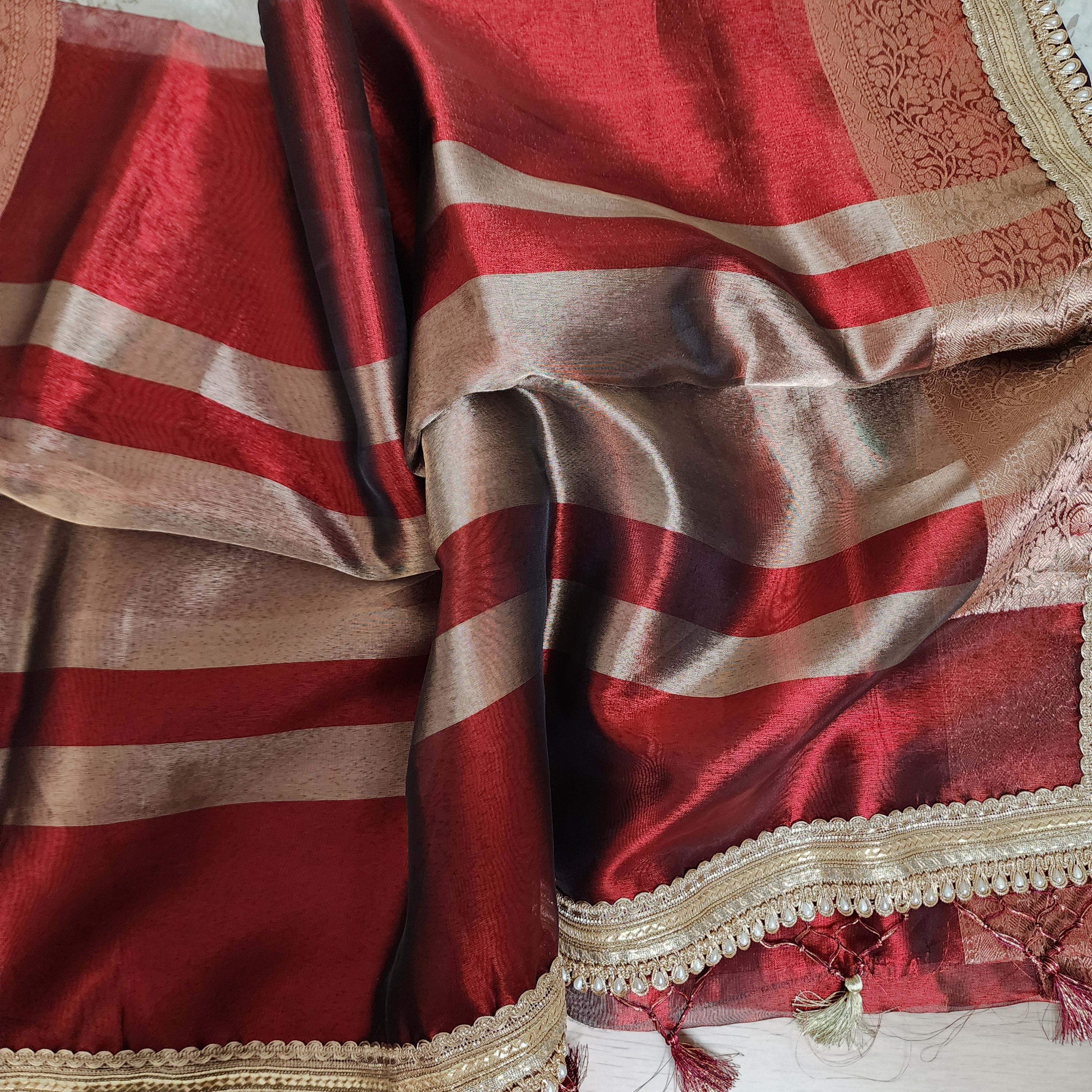Carmine Red Tissue Silk Saree with beaded lace work