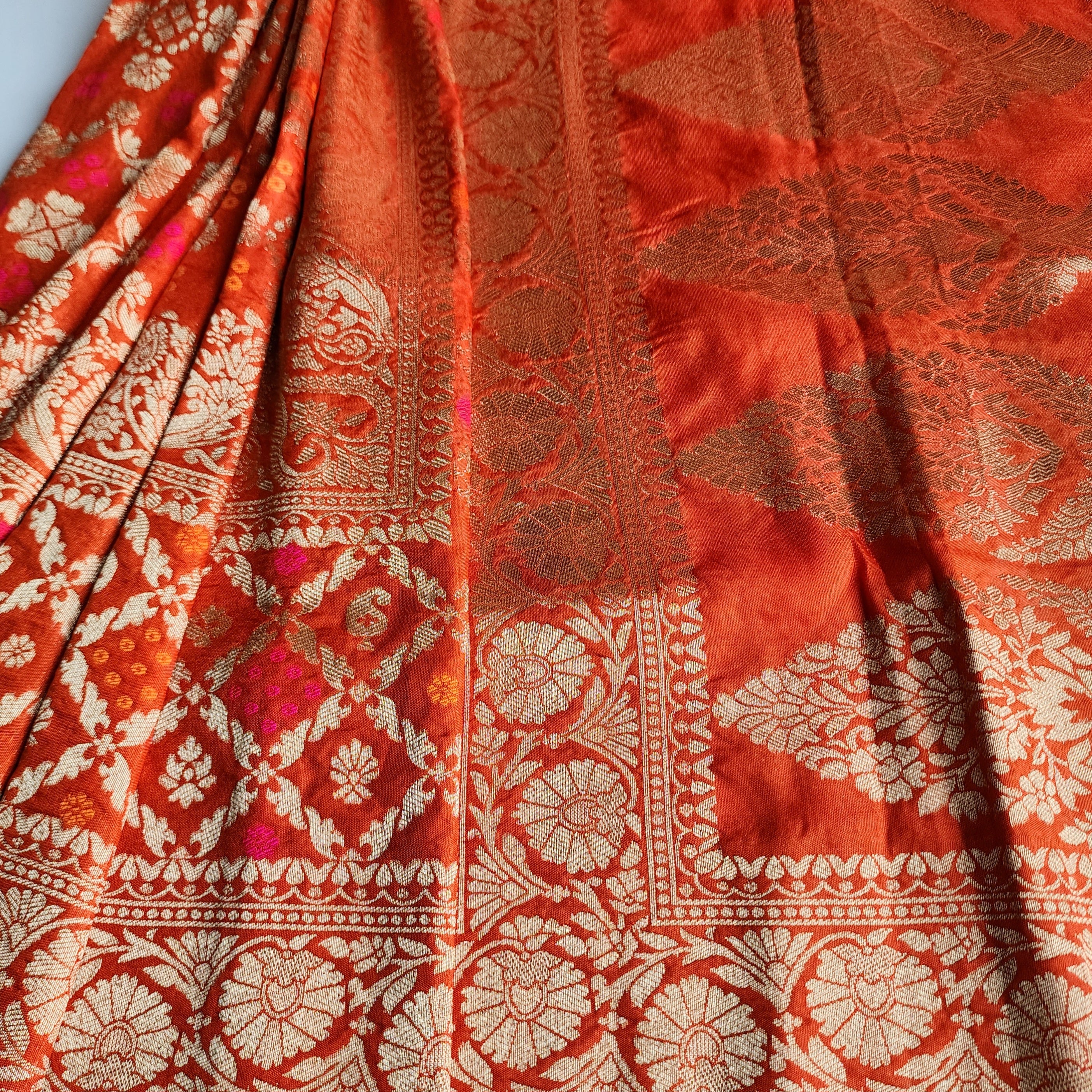Burnt Orange Bandhani Dupatta with Floral and Geometric Zari Weave