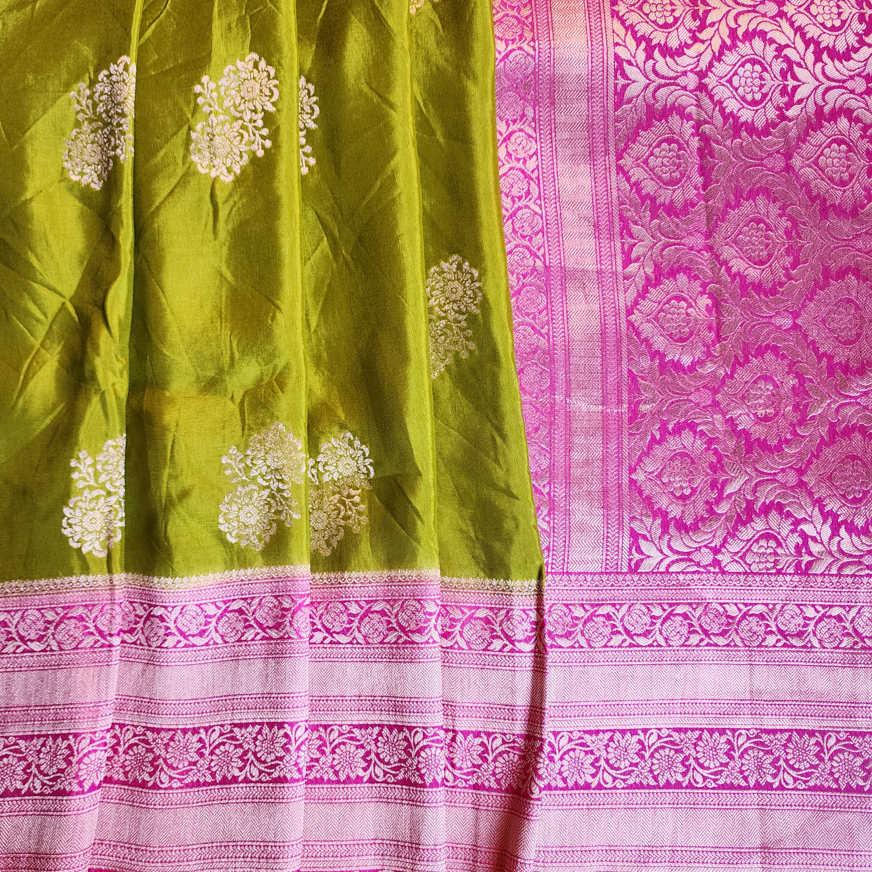 Olive Green Muslin Silk Saree with Traditional Silver Zari Work