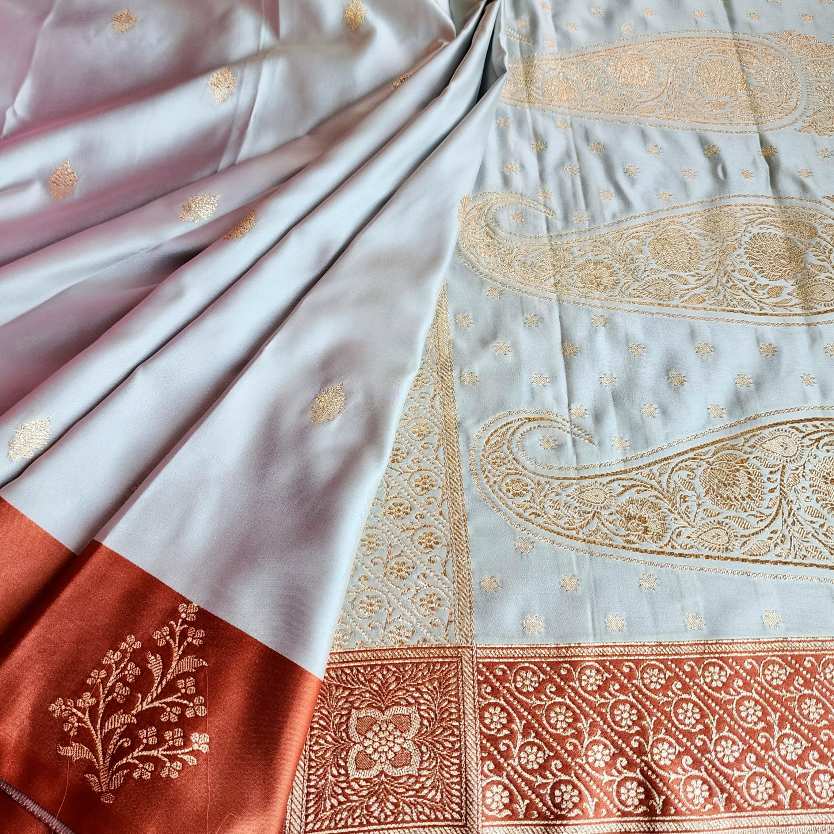 Ice Blue Katan Silk Saree with Peach Beige Gold Zari Border