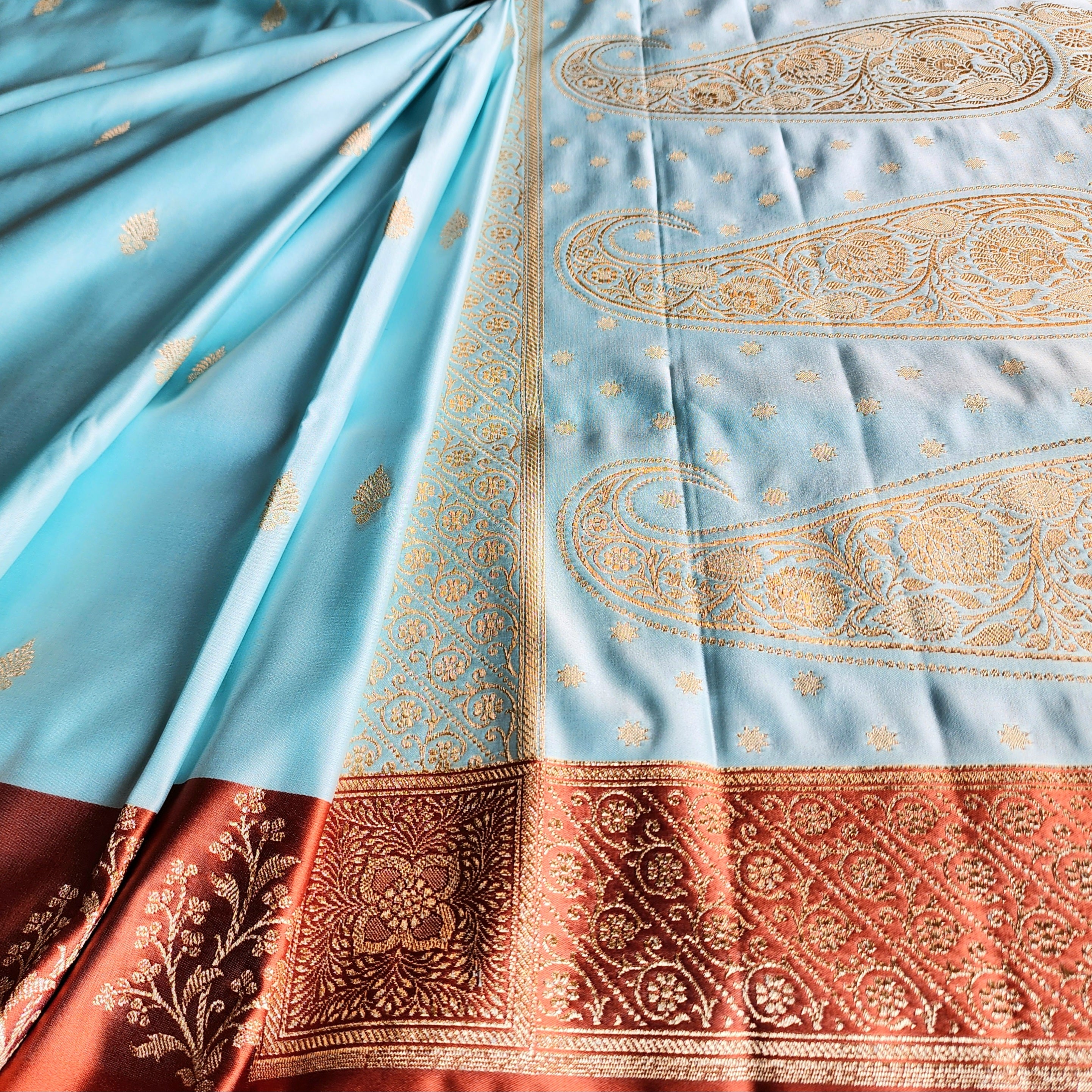 Powder Blue Katan Silk Saree with Rust Orange Gold Zari Border