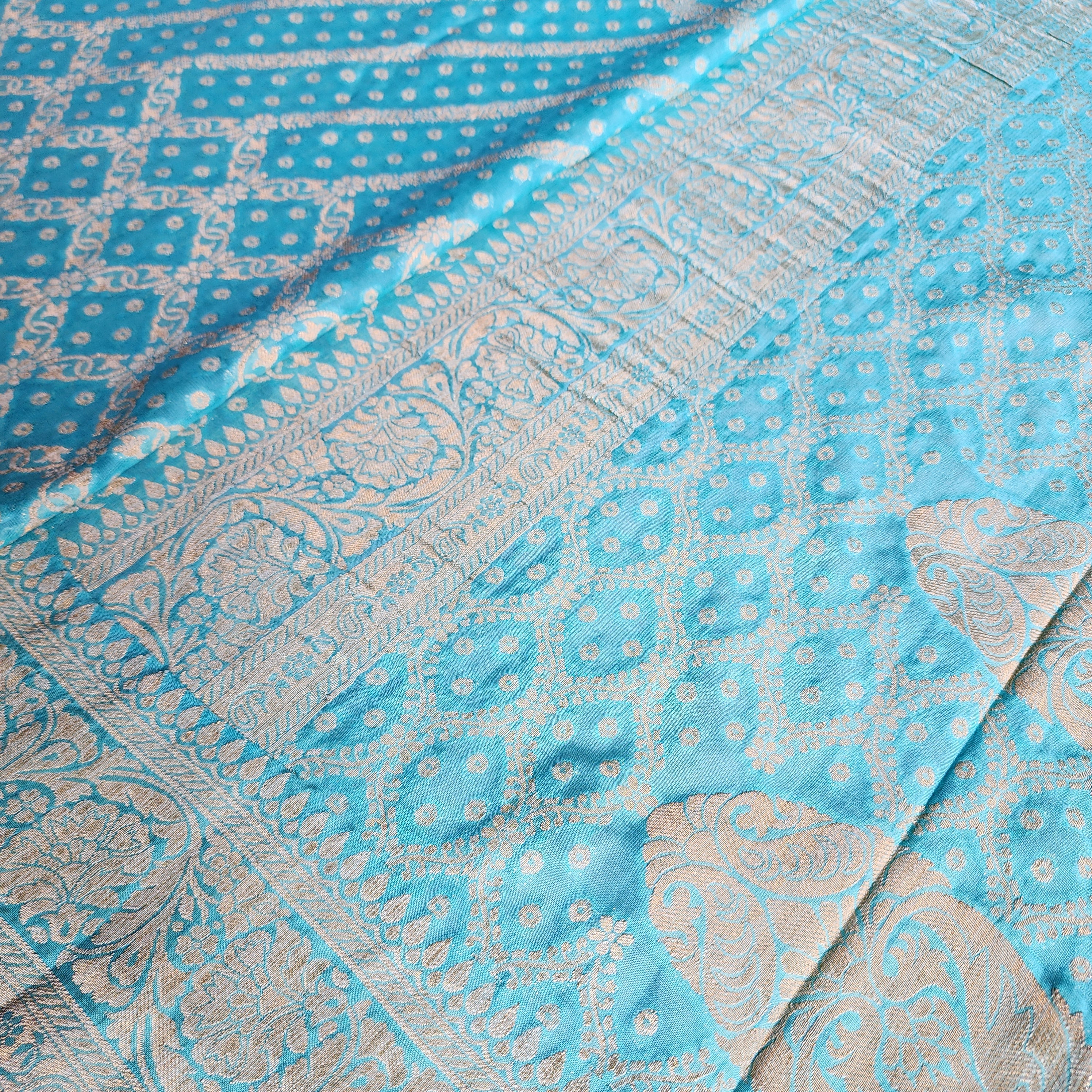 Turquoise Pure Khaddi Georgette Banarasi Saree with Golden Zari