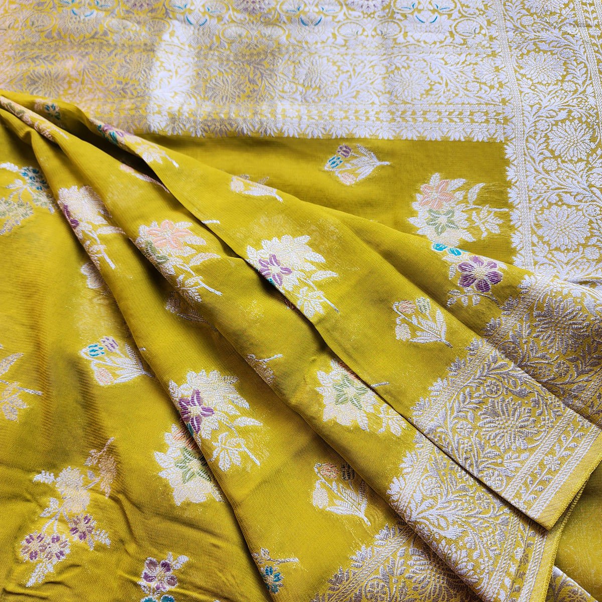 Yellowish Green Muslin Silk Saree with Floral Weave