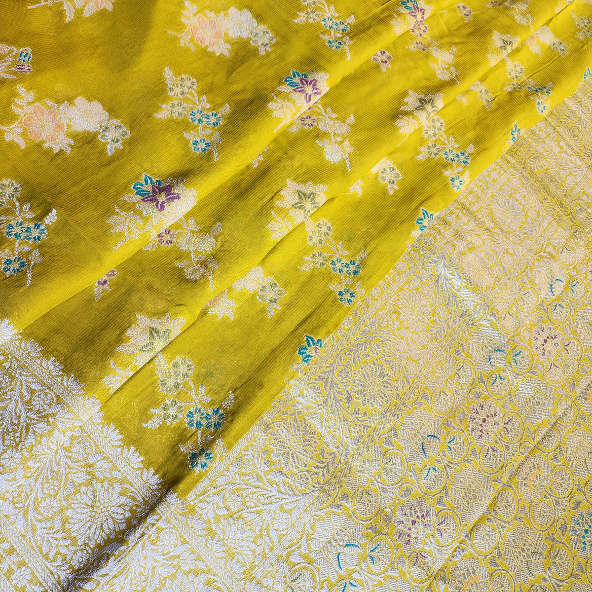 Yellowish Green Muslin Silk Saree with Floral Weave