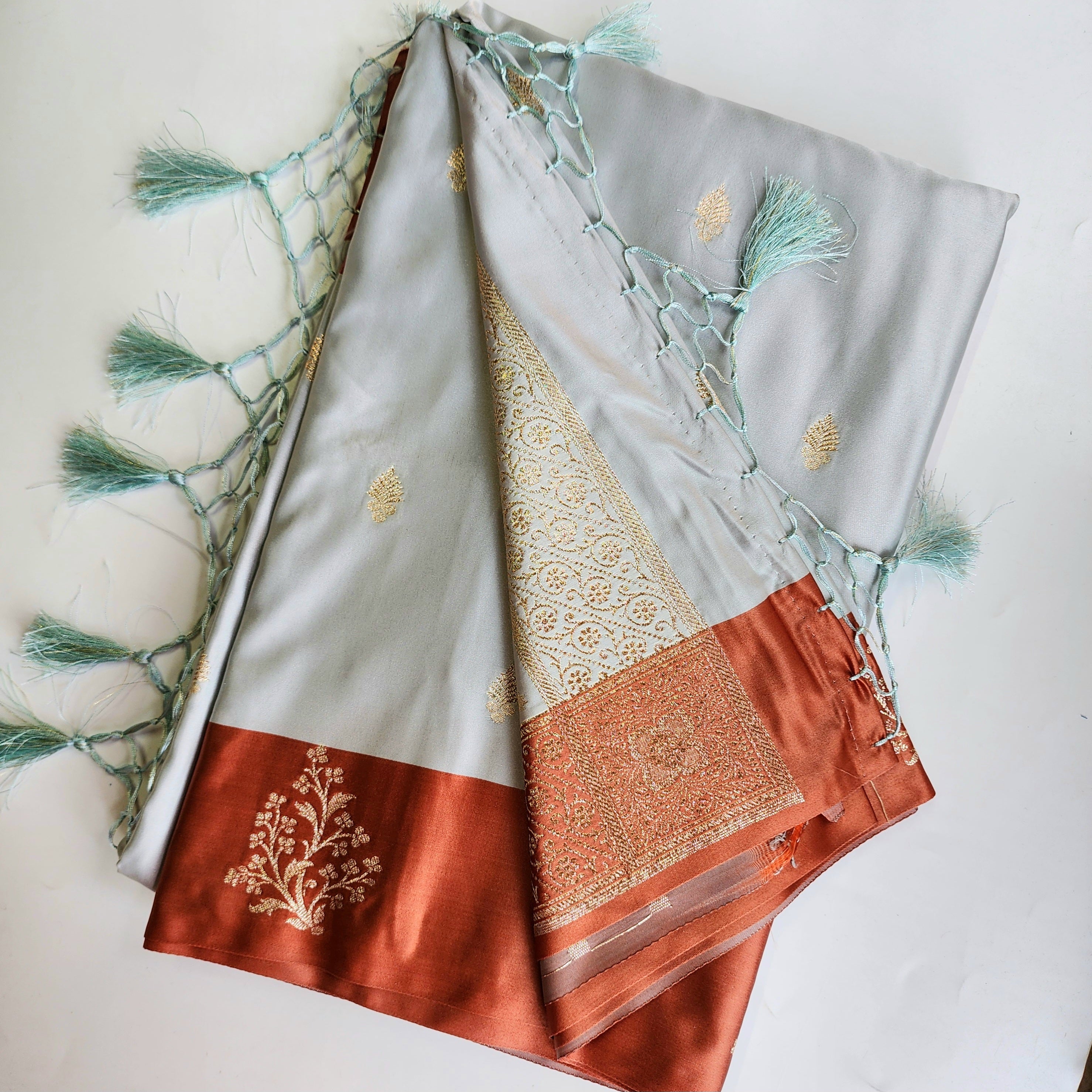 Ice Blue Katan Silk Saree with Peach Beige Gold Zari Border