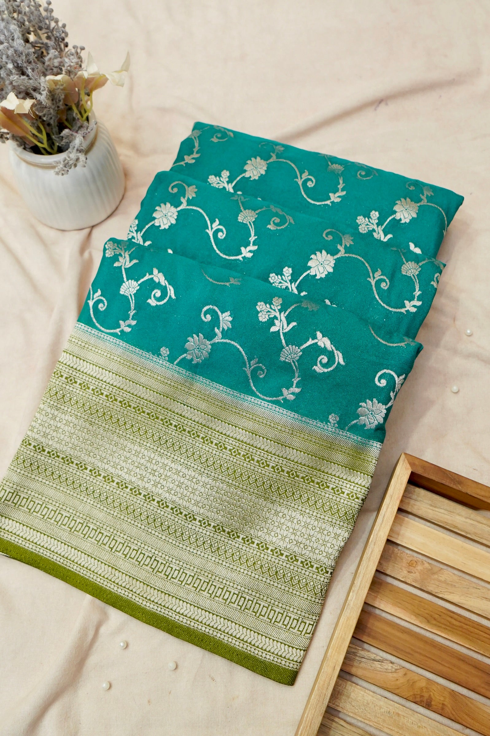 Teal Green Crepe Georgette Silk Saree with Gold Zari Border