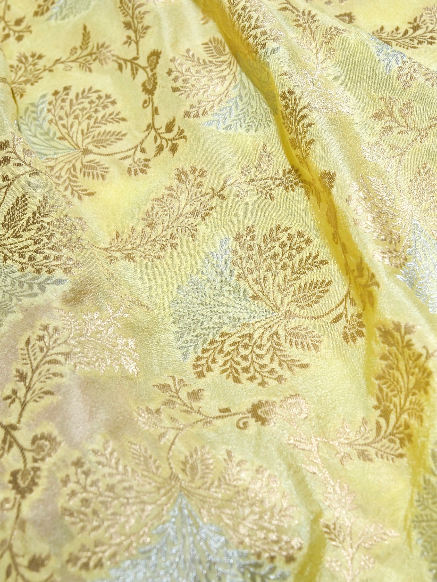 Lemon Yellow Crepe Georgette Silk Saree with Fuchsia Pink and Champagne Gold Border