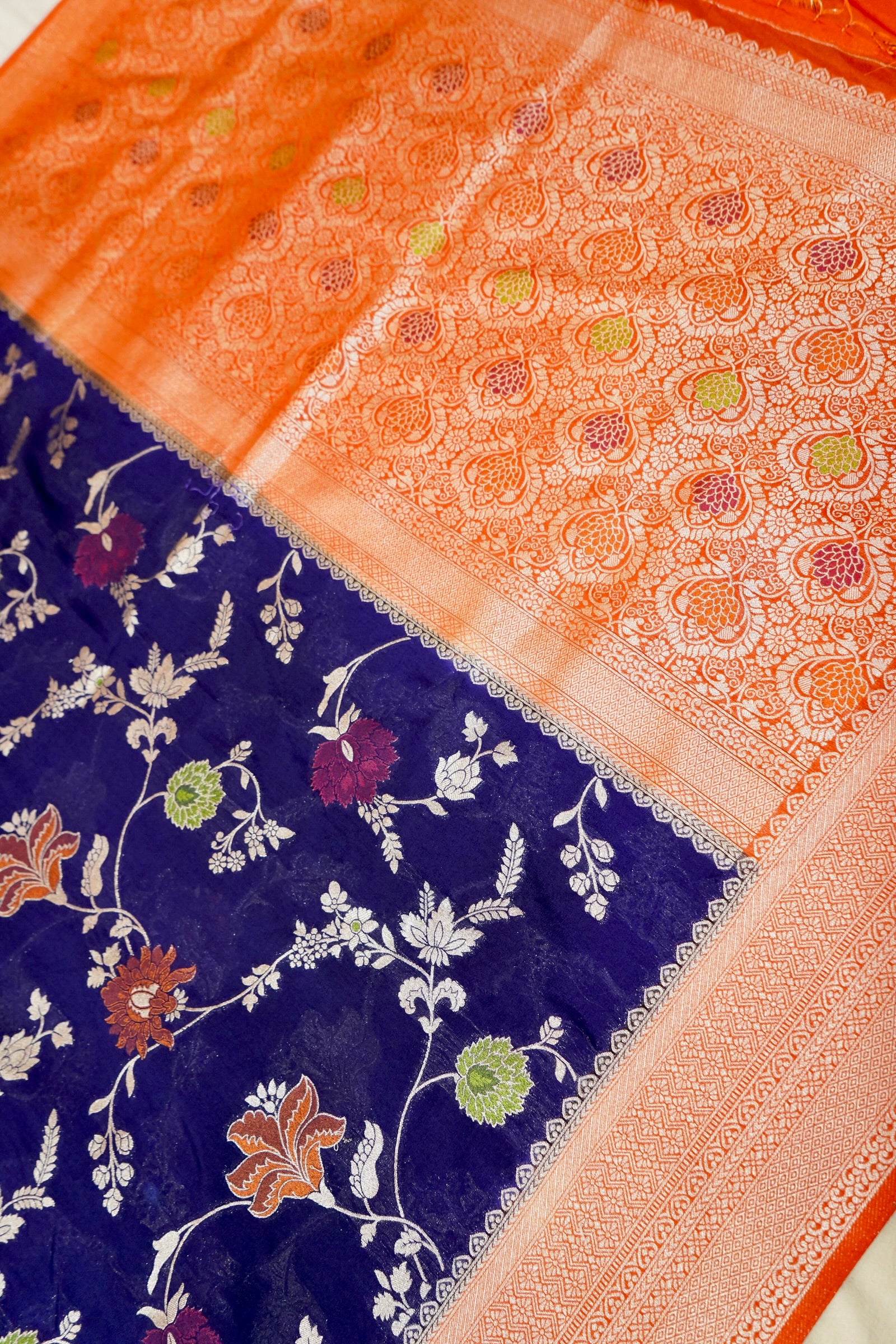 Royal Blue Crepe Georgette Silk Saree with Orange and Gold Zari Border