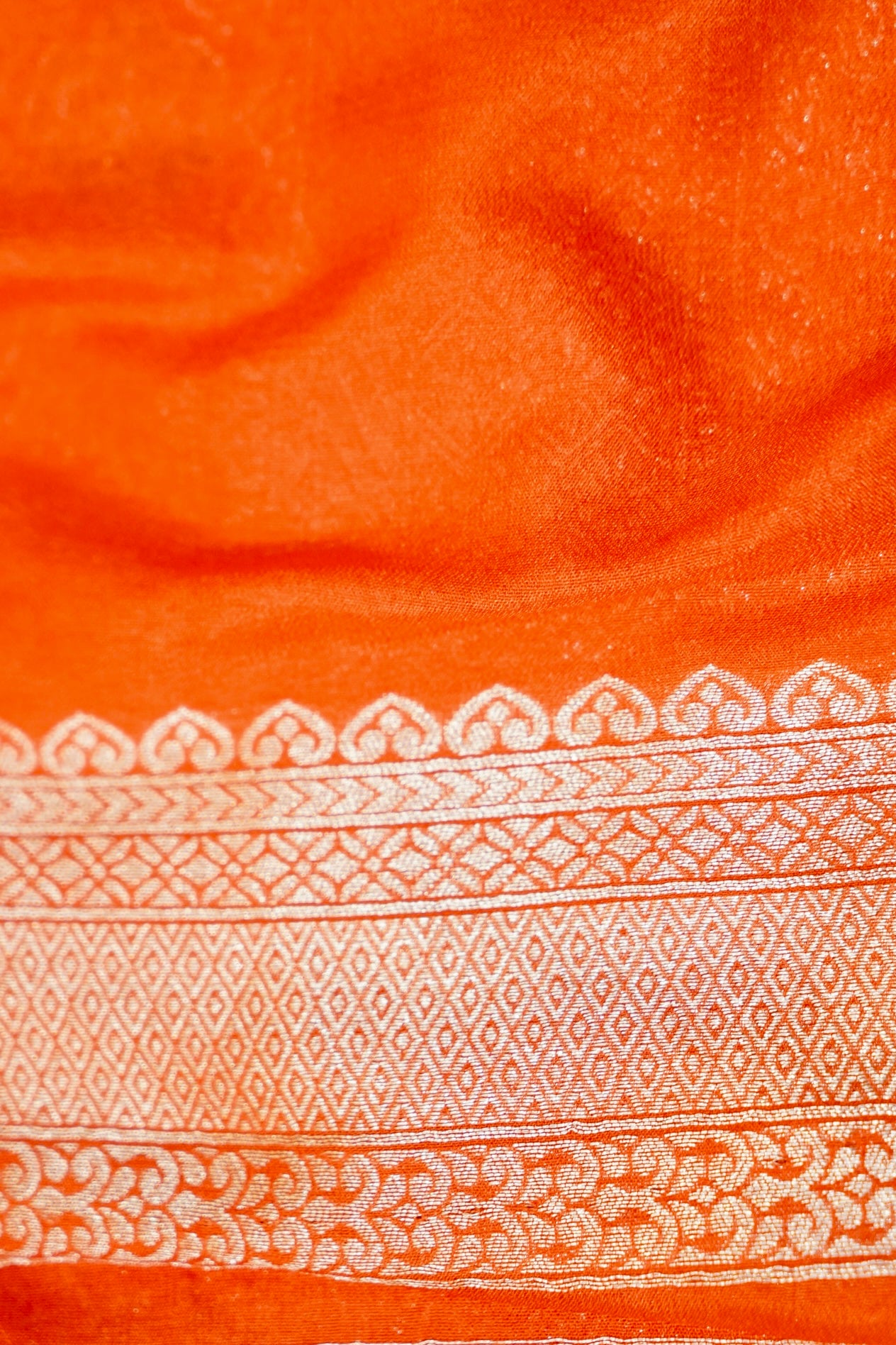 Royal Blue Crepe Georgette Silk Saree with Orange and Gold Zari Border