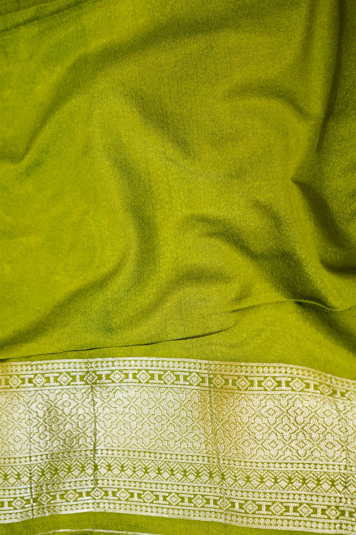 Teal Green Crepe Georgette Silk Saree with Gold Zari Border