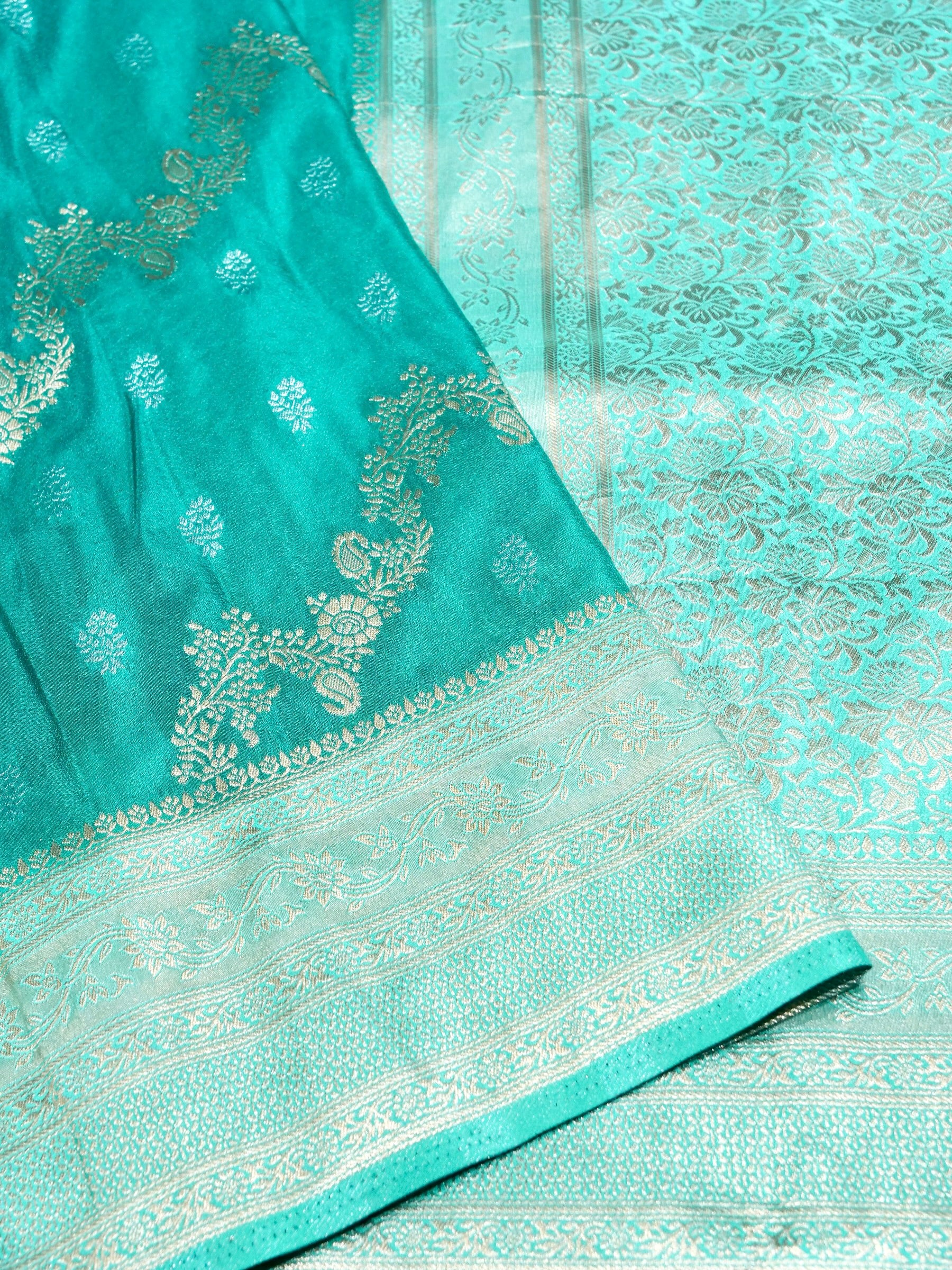 Teal Green Crepe Georgette Silk Saree with Champagne Gold Border