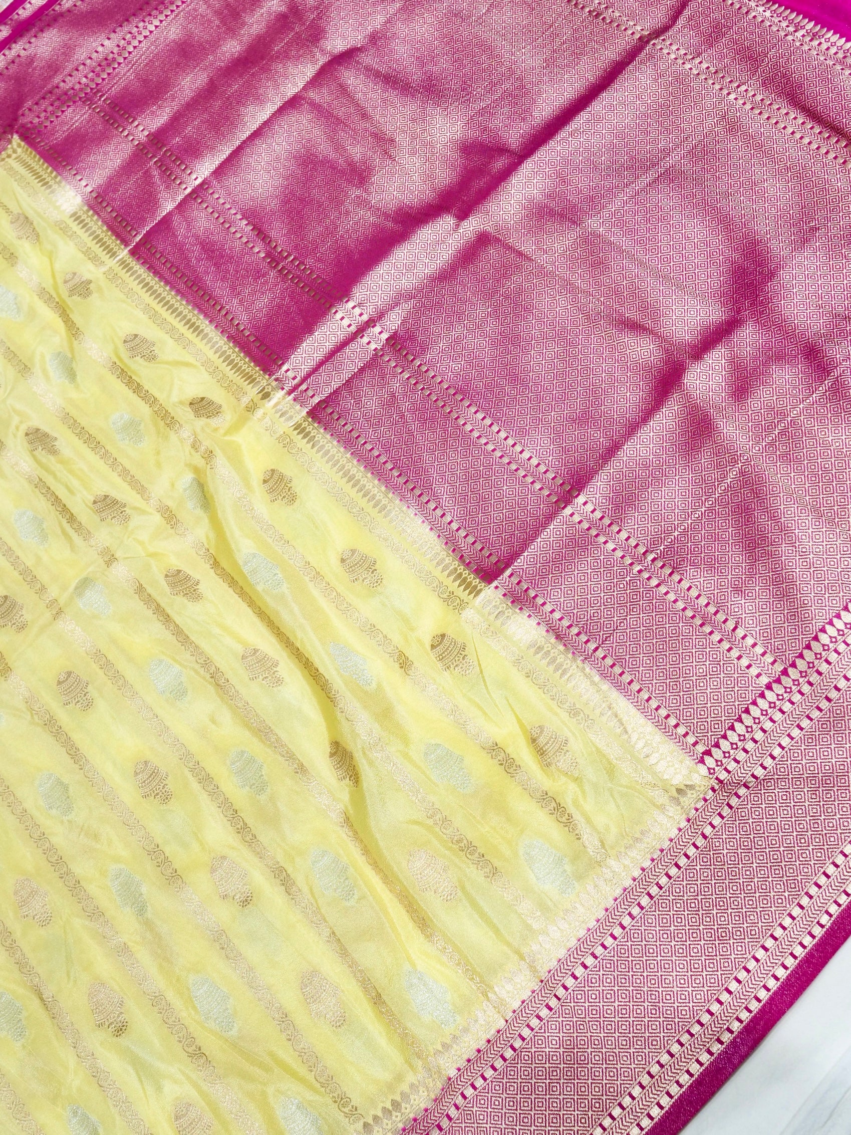 Butter Yellow Crepe Georgette Silk Saree with Rani Pink Border