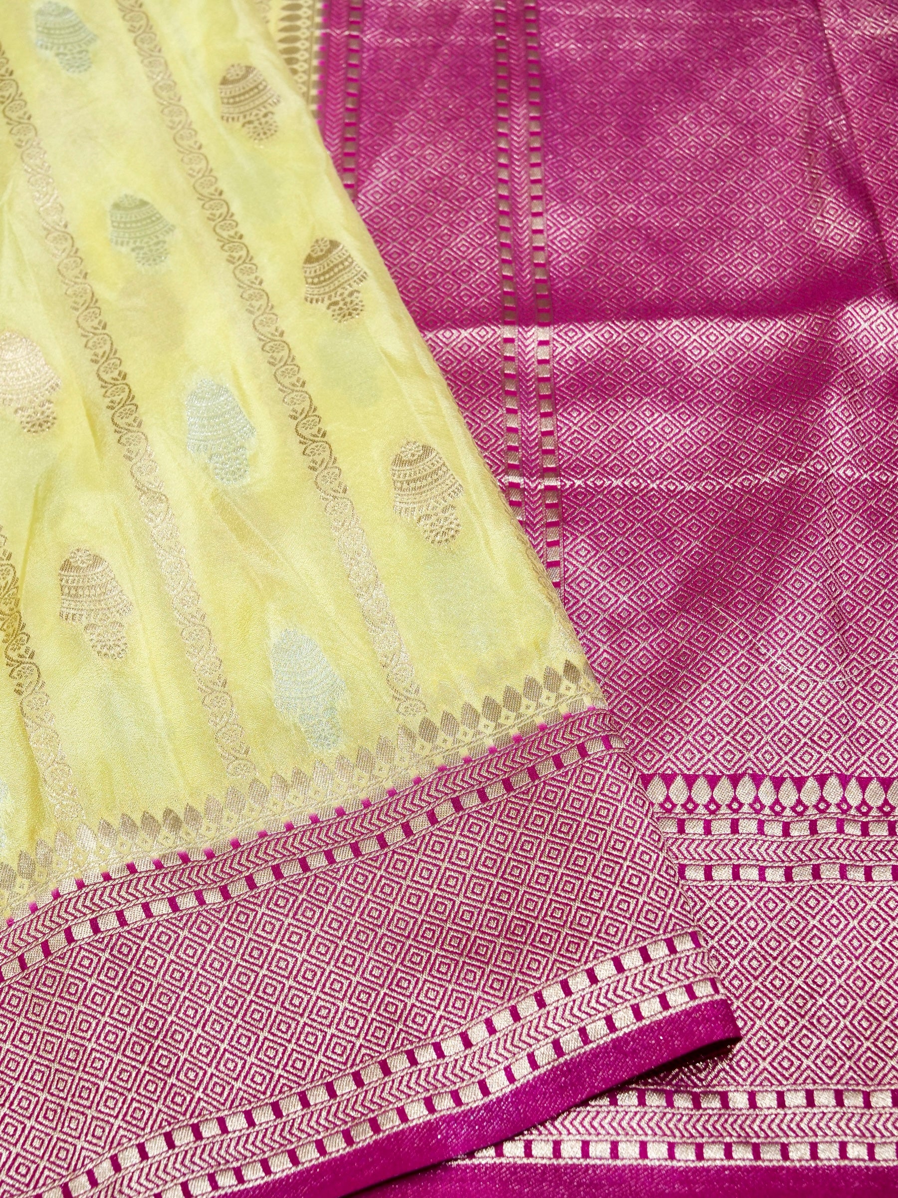 Butter Yellow Crepe Georgette Silk Saree with Rani Pink Border