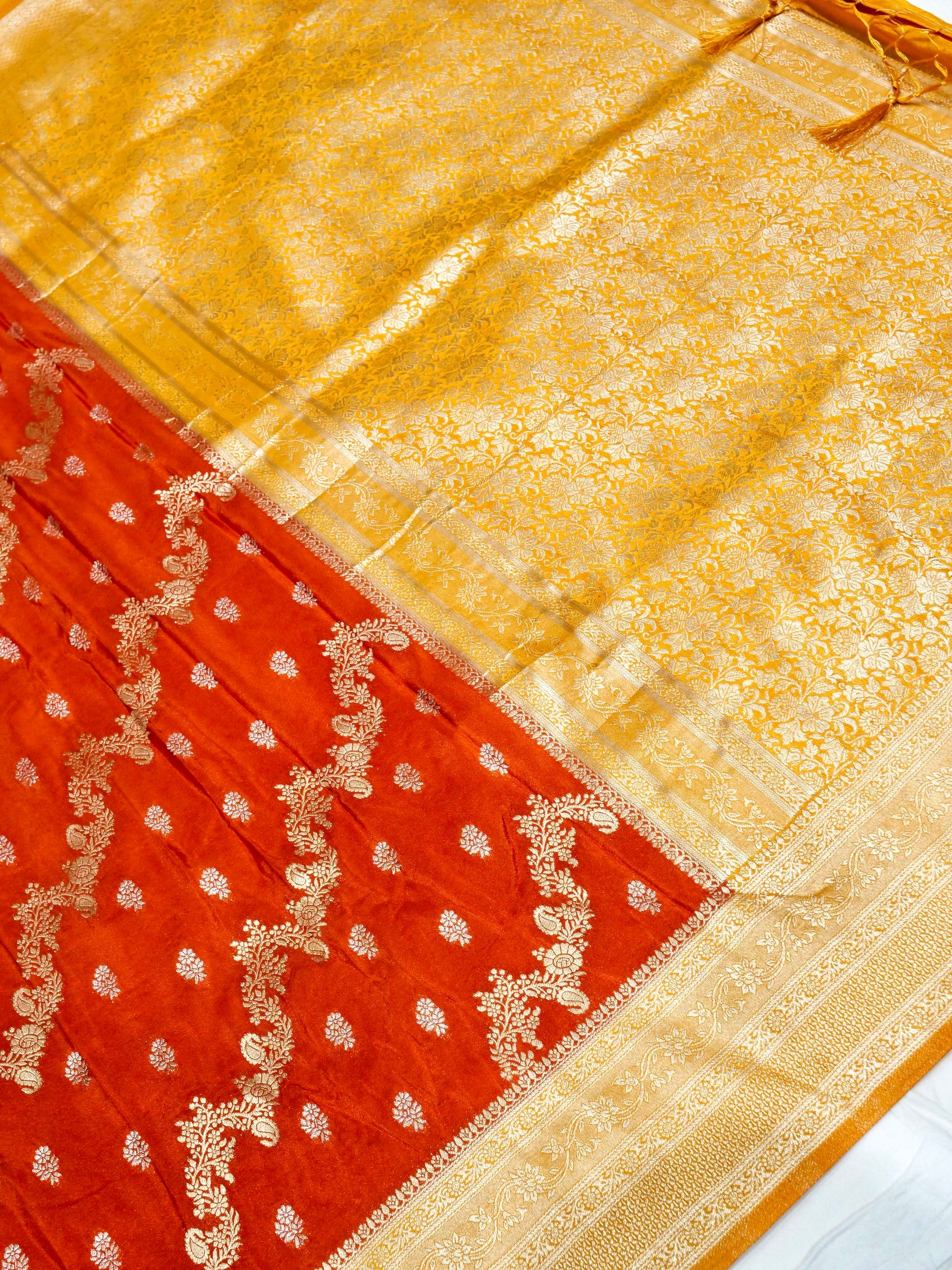 Burnt Orange Crepe Georgette Silk Saree with Yellow and Champagne Gold Border