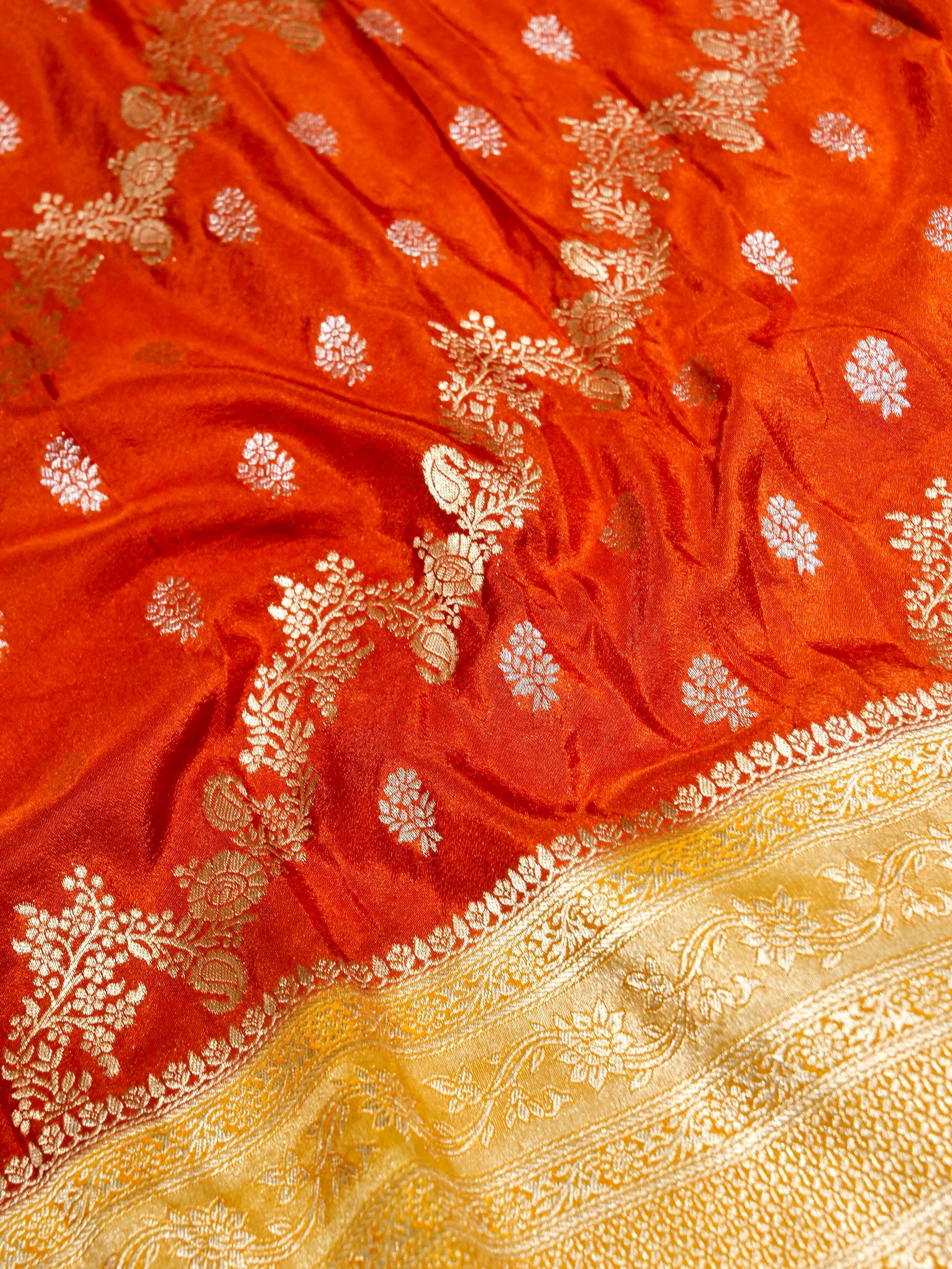 Burnt Orange Crepe Georgette Silk Saree with Yellow and Champagne Gold Border