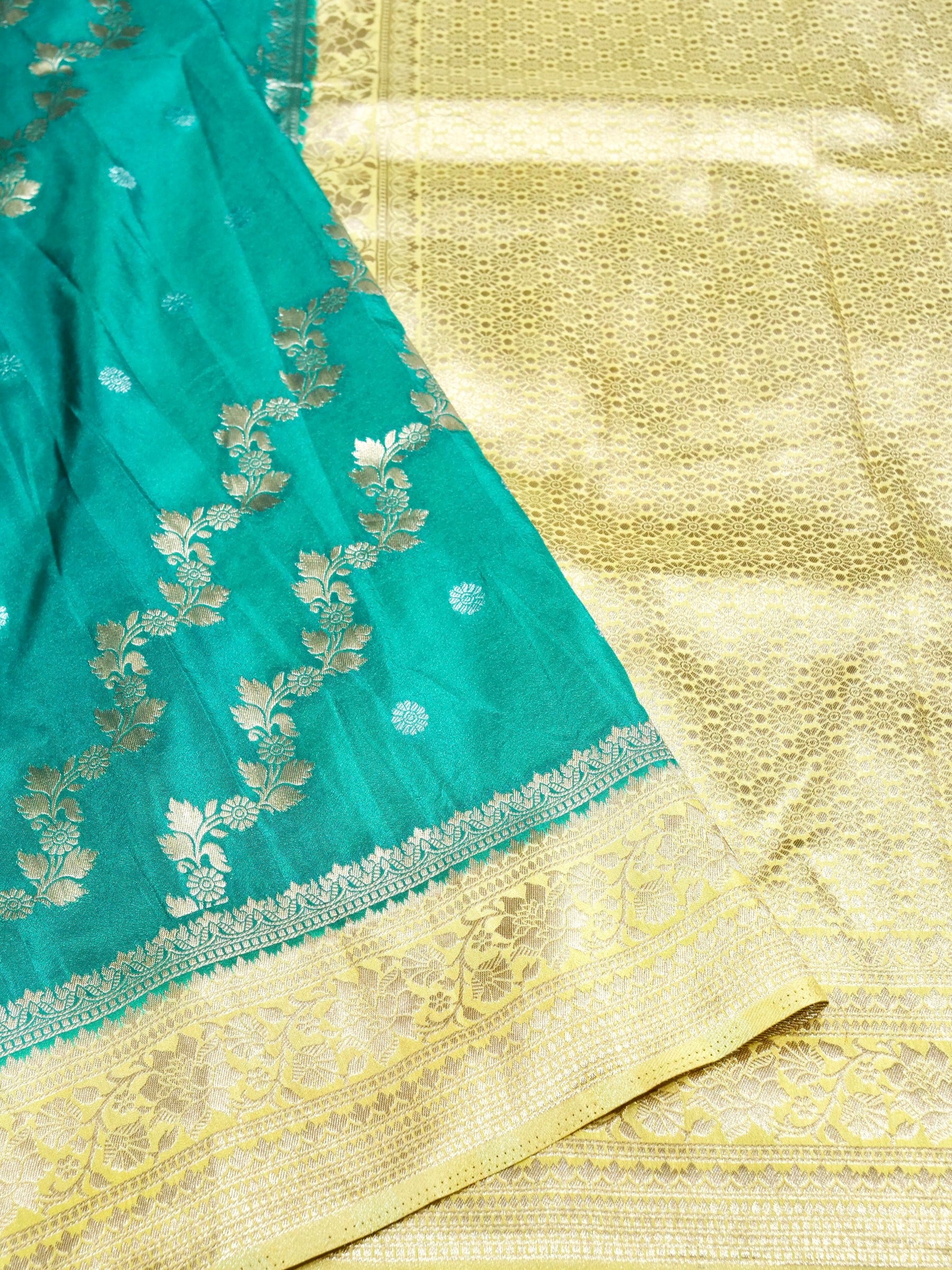 Teal Green Crepe Georgette Silk Saree with Antique Gold Border