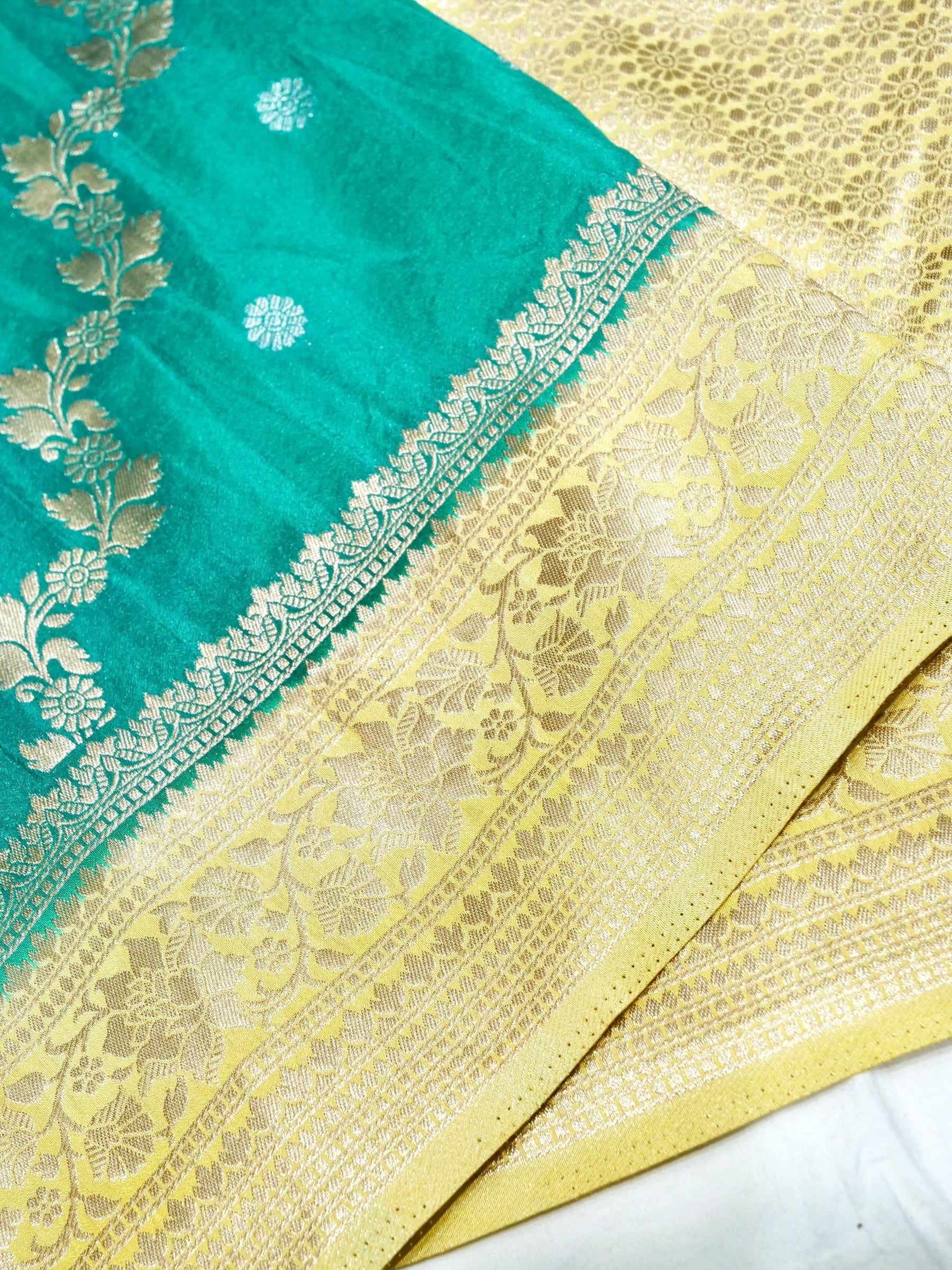 Teal Green Crepe Georgette Silk Saree with Antique Gold Border