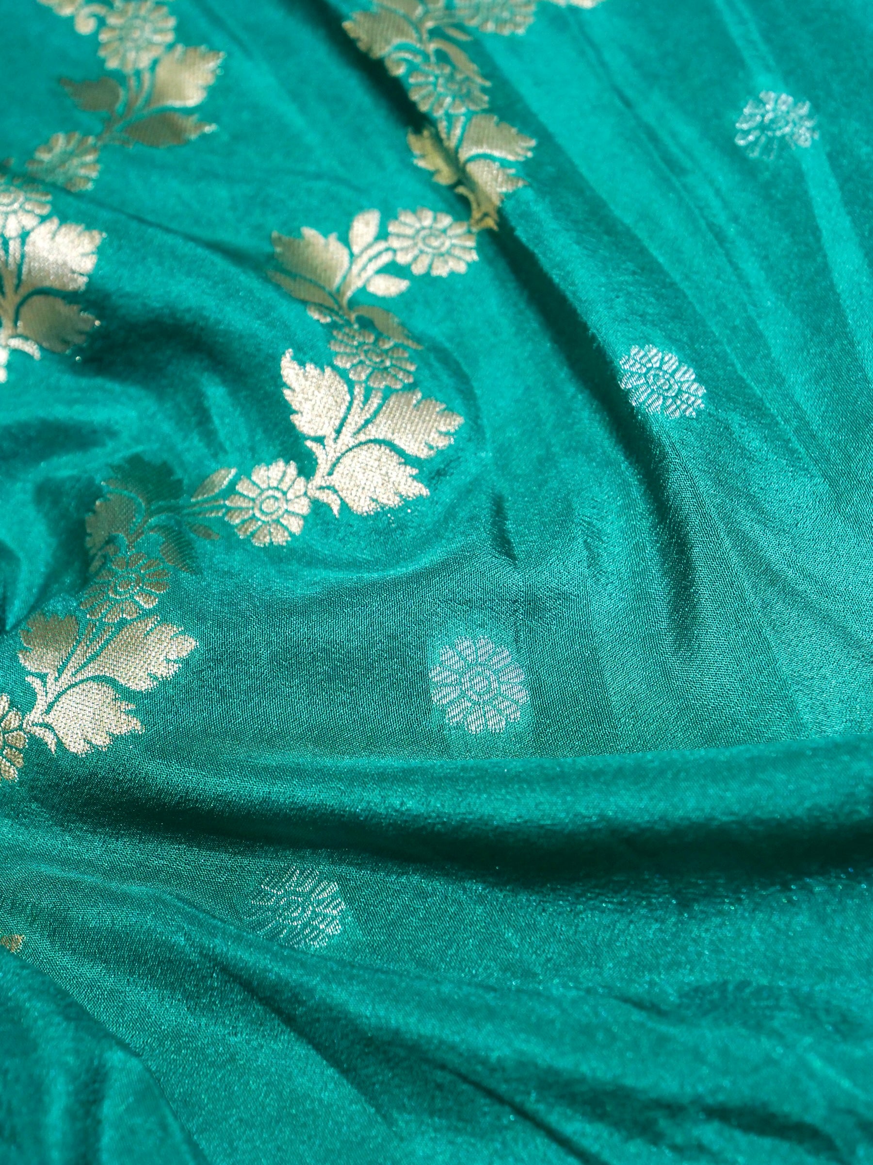 Teal Green Crepe Georgette Silk Saree with Antique Gold Border
