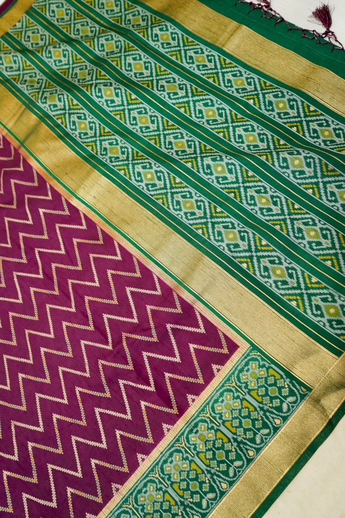 Plum Purple Dupion Patola Saree with Olive-Gold Border & Geometric Ikat Pattern