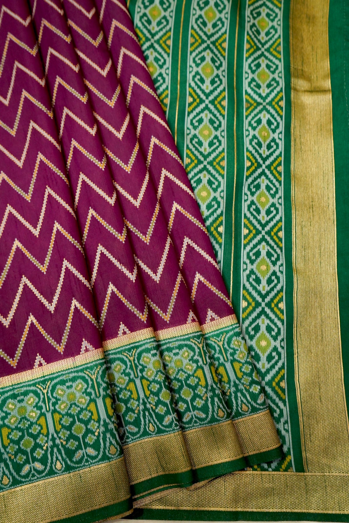Plum Purple Dupion Patola Saree with Olive-Gold Border & Geometric Ikat Pattern