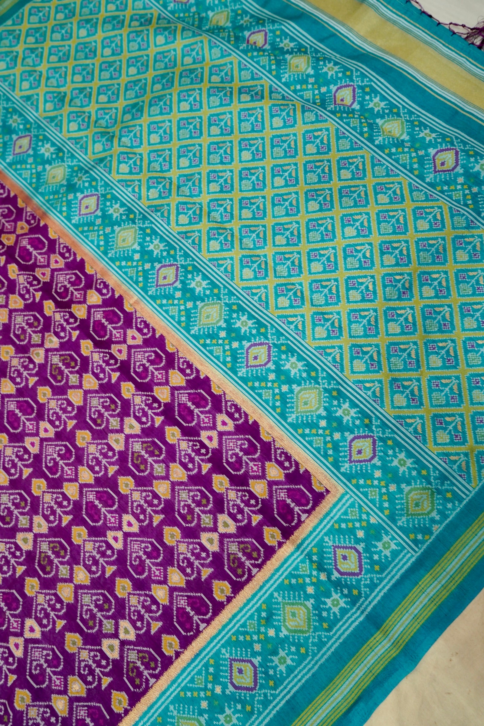 Purple Dupion Patola Saree with Teal Border & Traditional Motif Weave