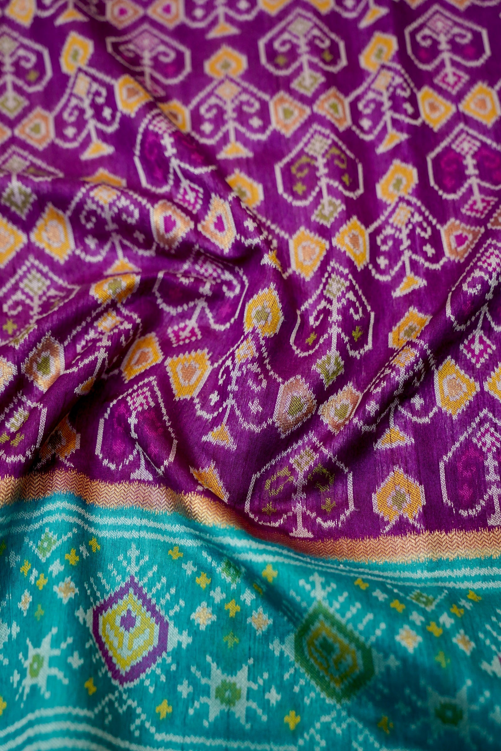 Purple Dupion Patola Saree with Teal Border & Traditional Motif Weave