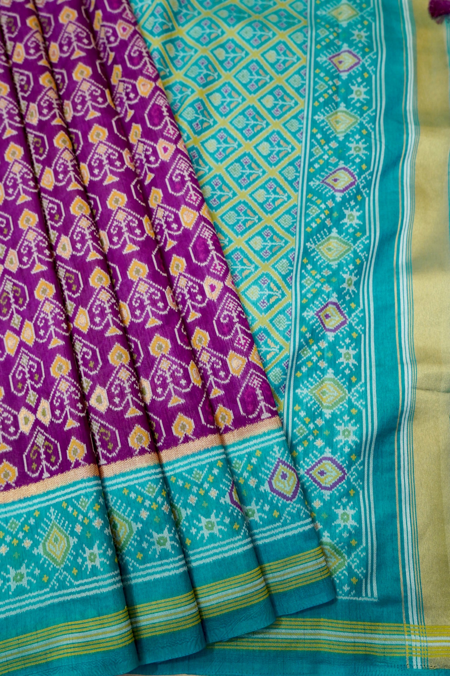 Purple Dupion Patola Saree with Teal Border & Traditional Motif Weave
