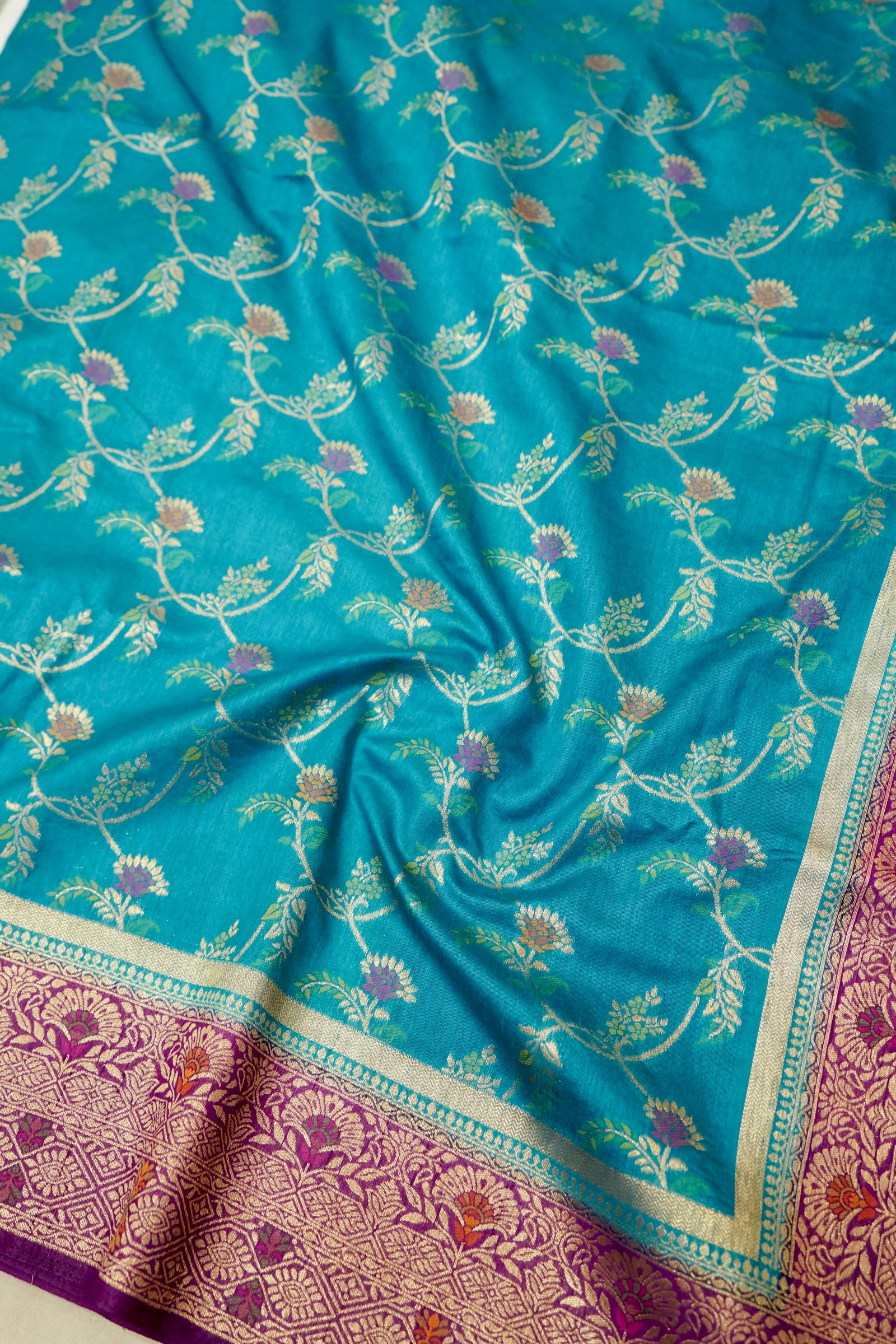 Turquoise Blue Dupion Patola Saree with Antique Gold Zari Floral Weave