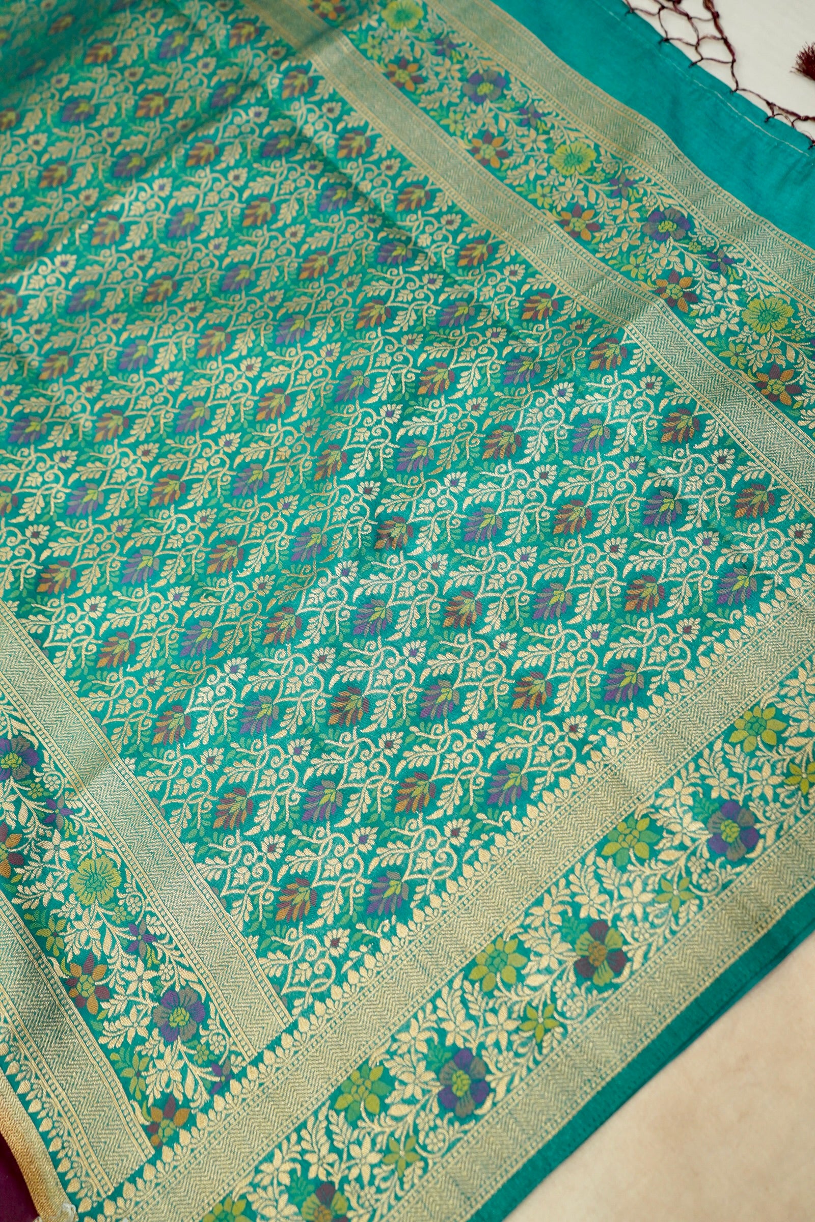 Wine Purple Dupion Patola Saree with Mint Green Border & Delicate Gold Zari Motifs