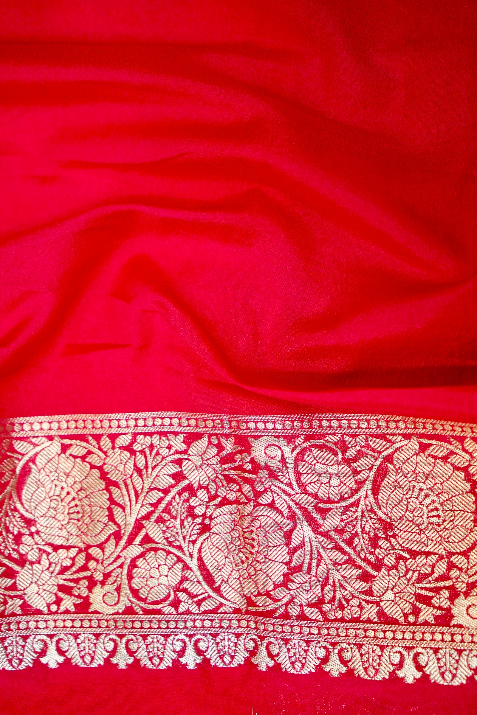 Orange Pure Crepe Silk Saree with Red and Gold Zari Border
