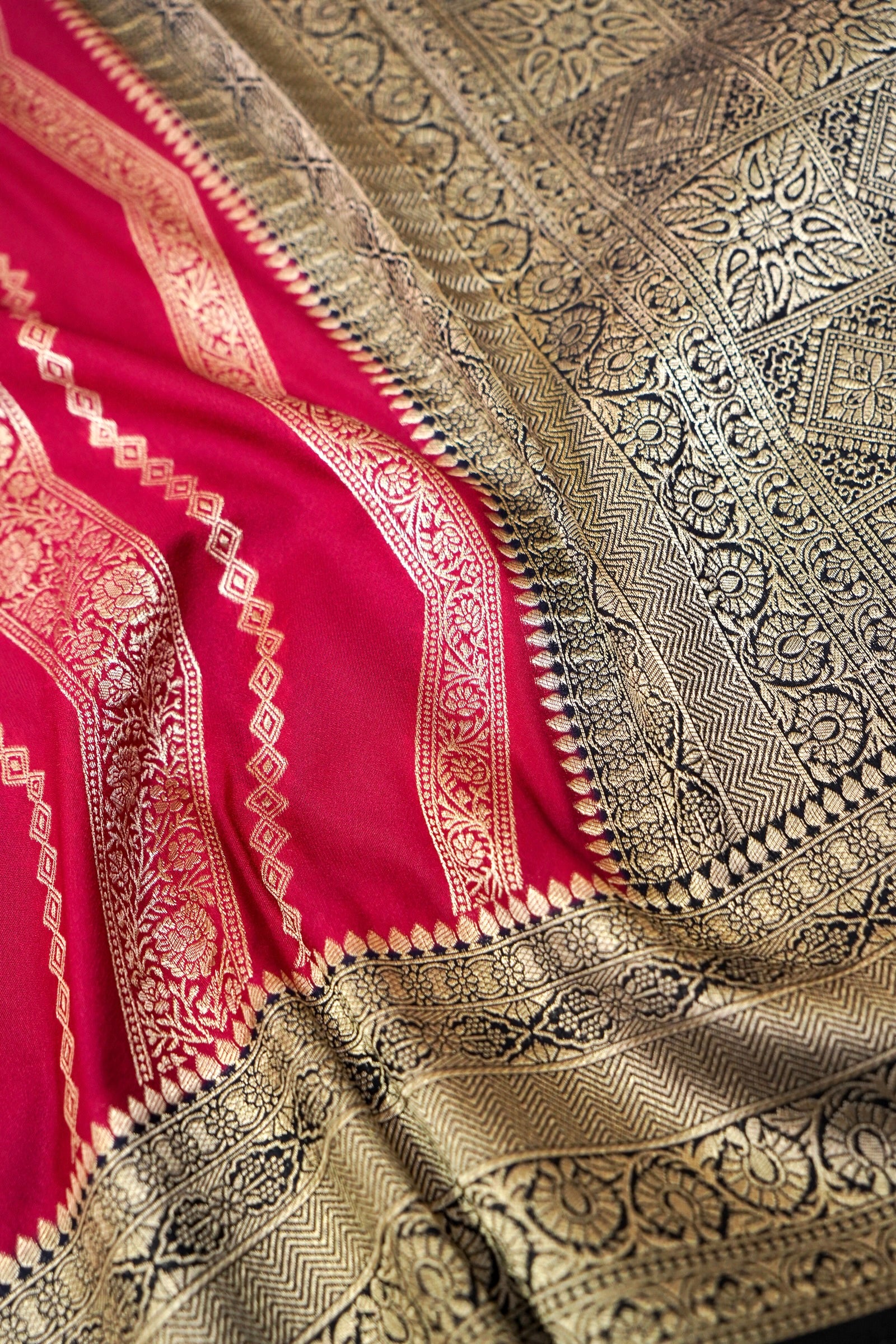 Crimson Red Crepe Georgette Silk Saree with Black and Gold Border