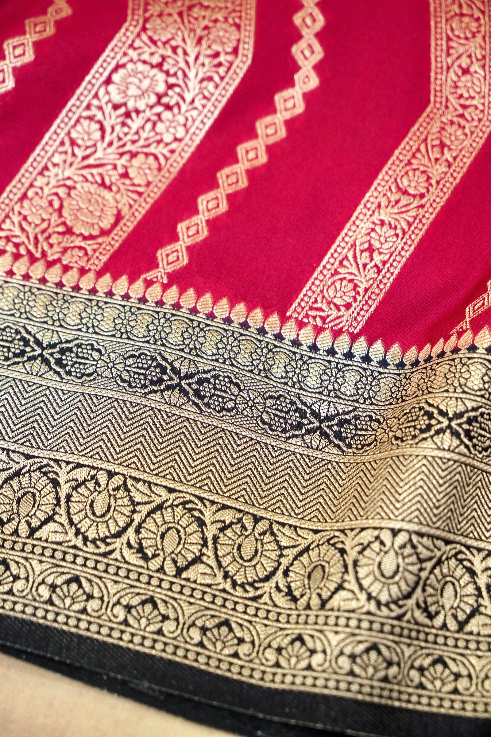 Crimson Red Crepe Georgette Silk Saree with Black and Gold Border