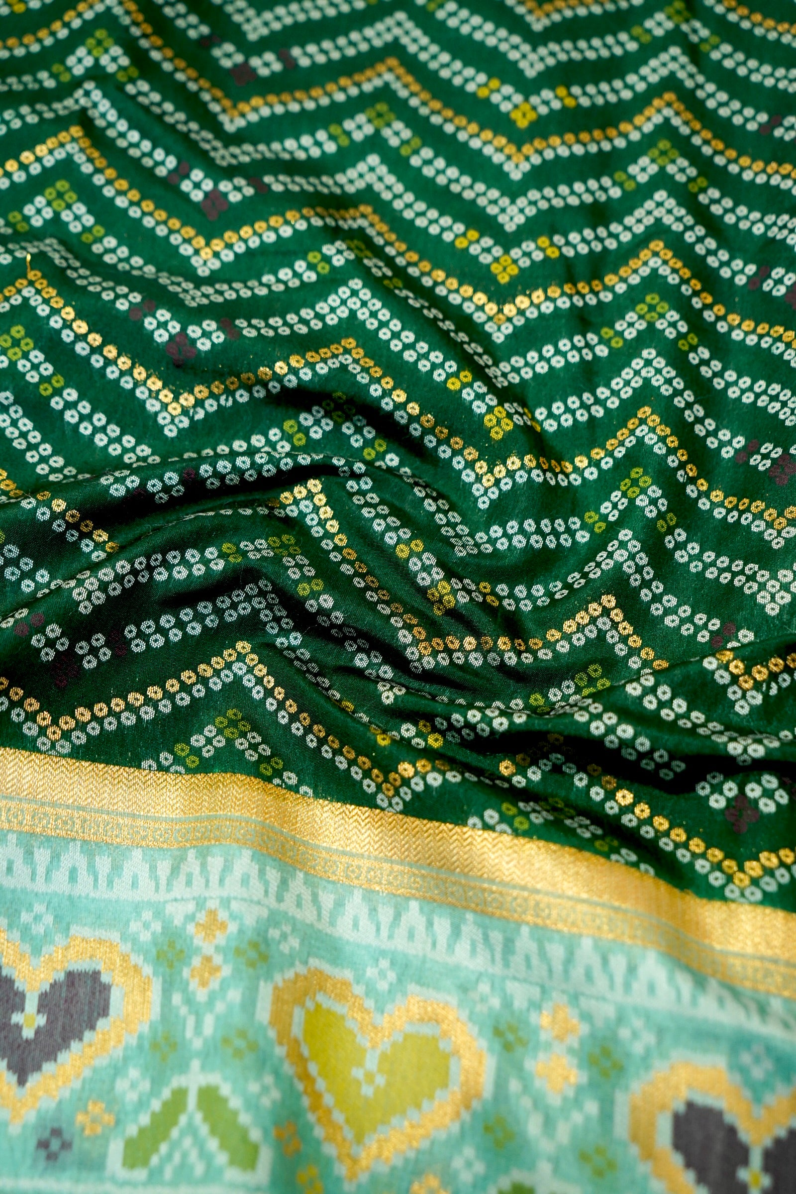 Bottle Green Ikkat Patola Silk Saree with Mint Green Border