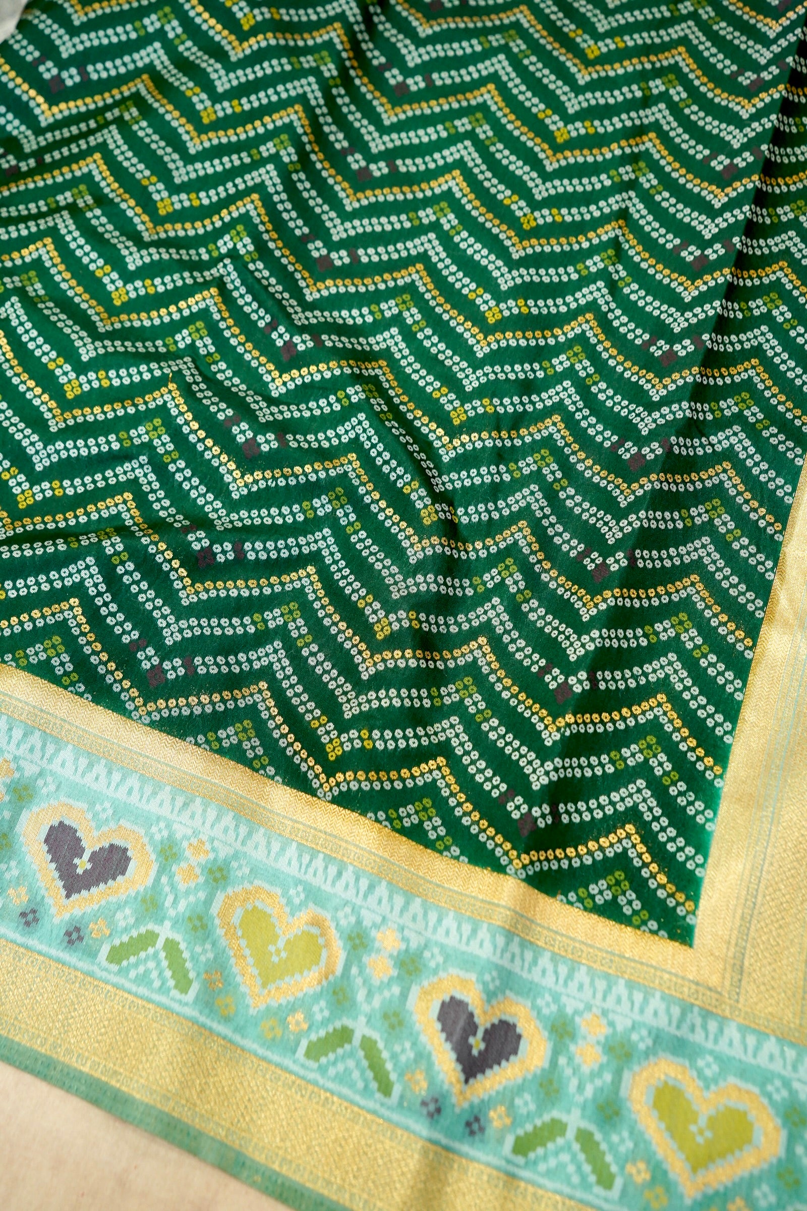 Bottle Green Ikkat Patola Silk Saree with Mint Green Border