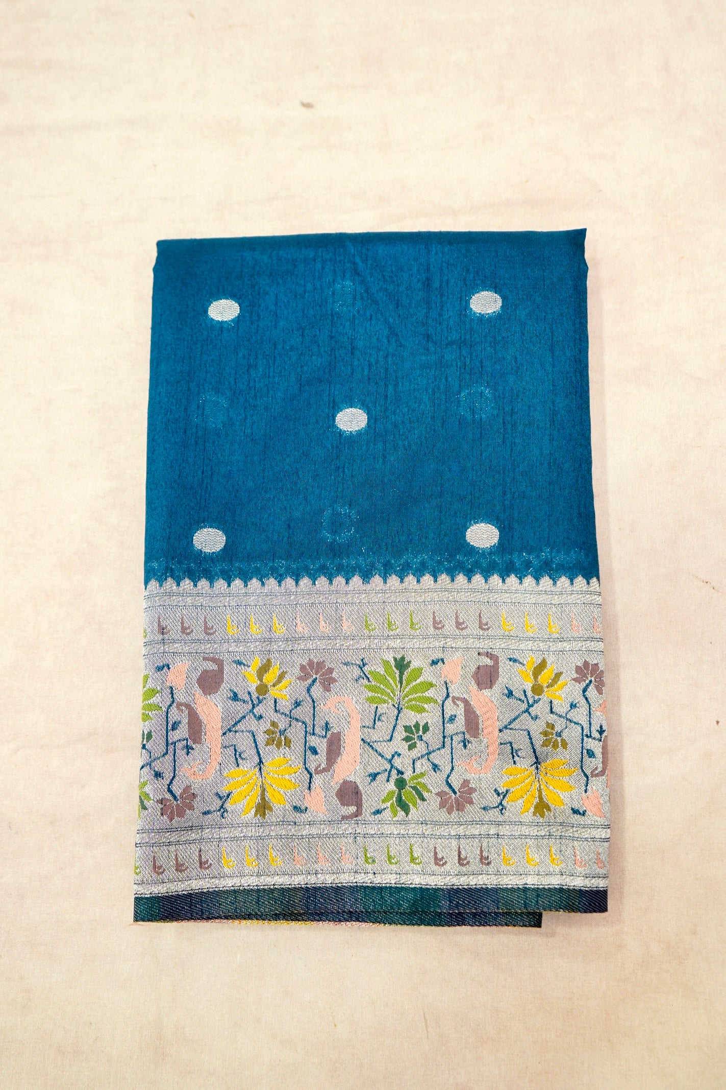 Teal Blue Raw Silk Saree with Light Gold Zari and Multicolor Floral Border