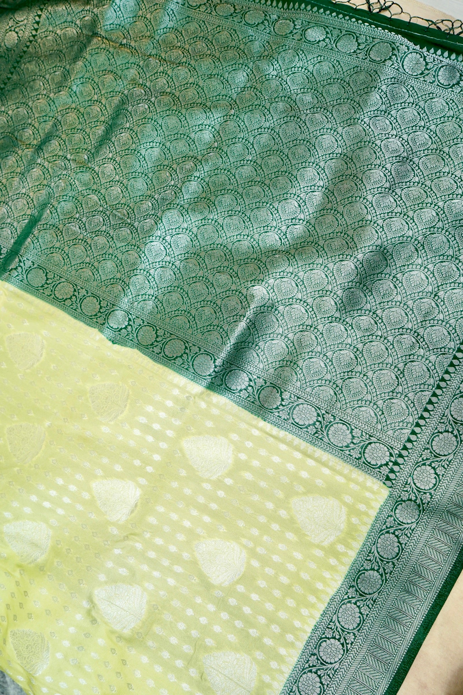 Pistachio Green Crepe Georgette Silk Saree with Dark Green Border