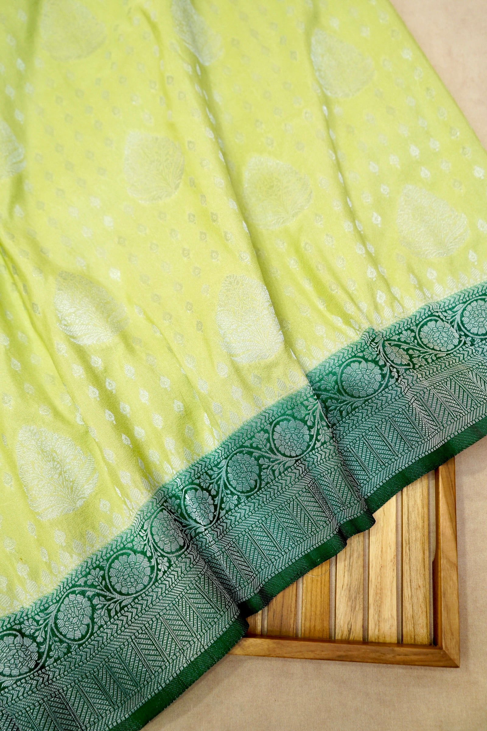 Pistachio Green Crepe Georgette Silk Saree with Dark Green Border