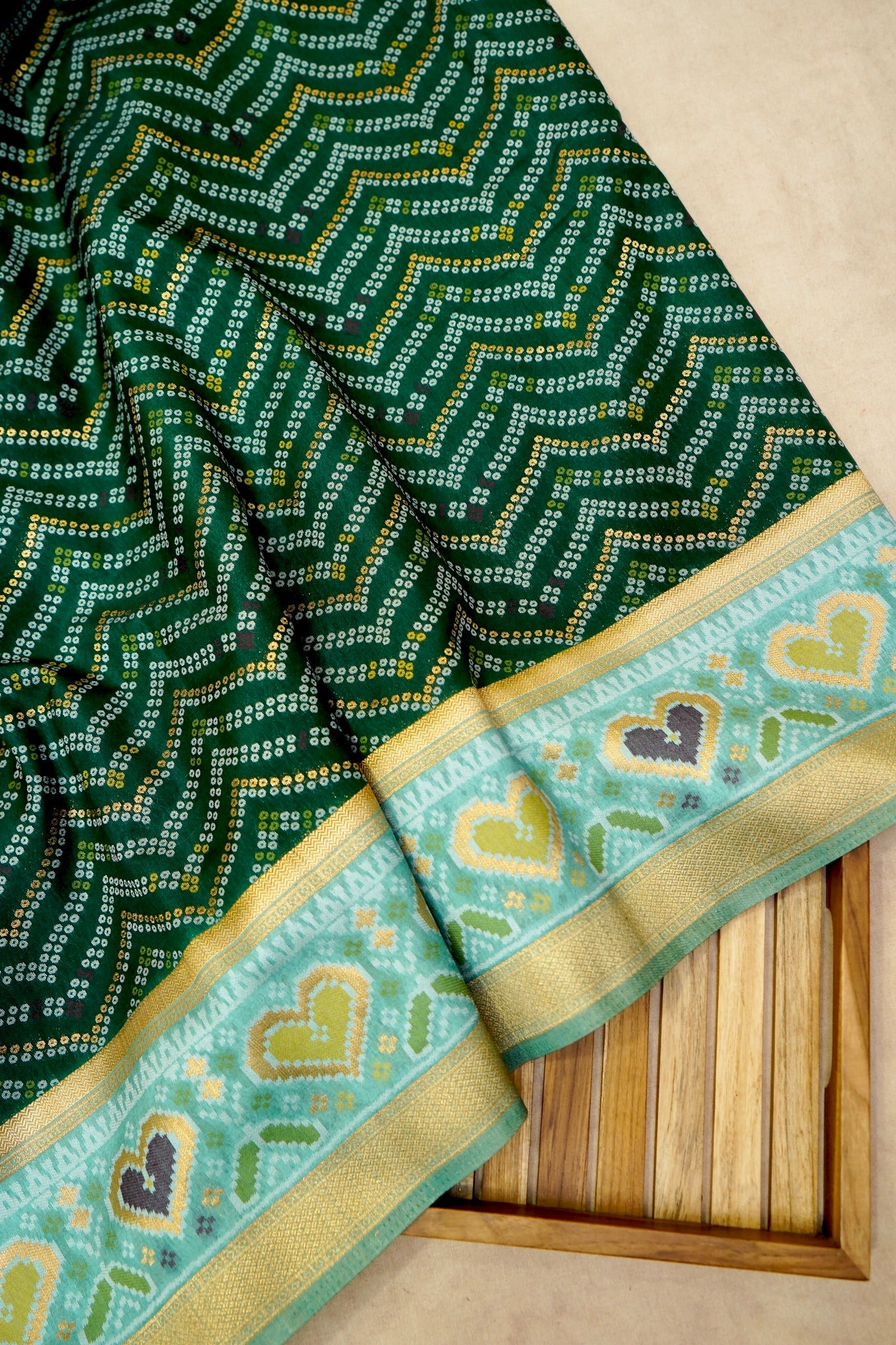 Bottle Green Ikkat Patola Silk Saree with Mint Green Border