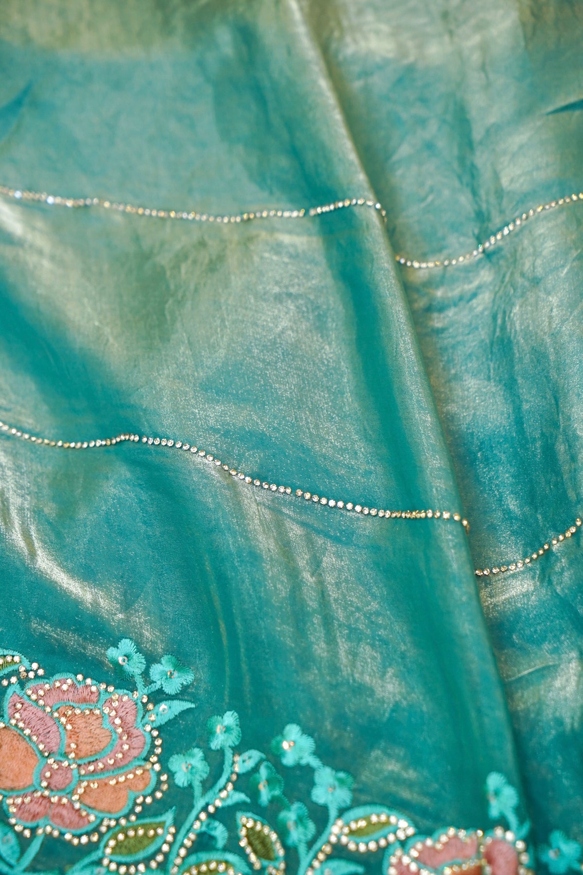 Turquoise Blue Camellia Bloom Designer Tissue Saree with Rhinestone