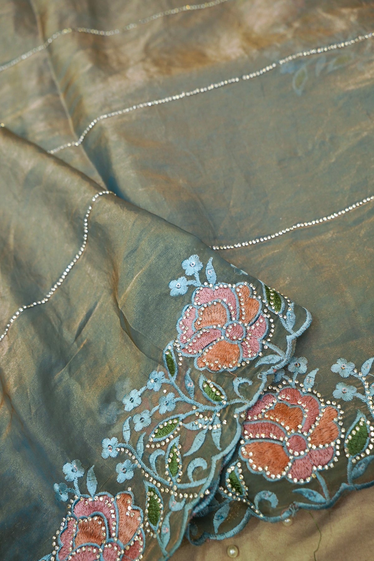 Sea Green Camellia Bloom Designer Tissue Saree with Rhinestone