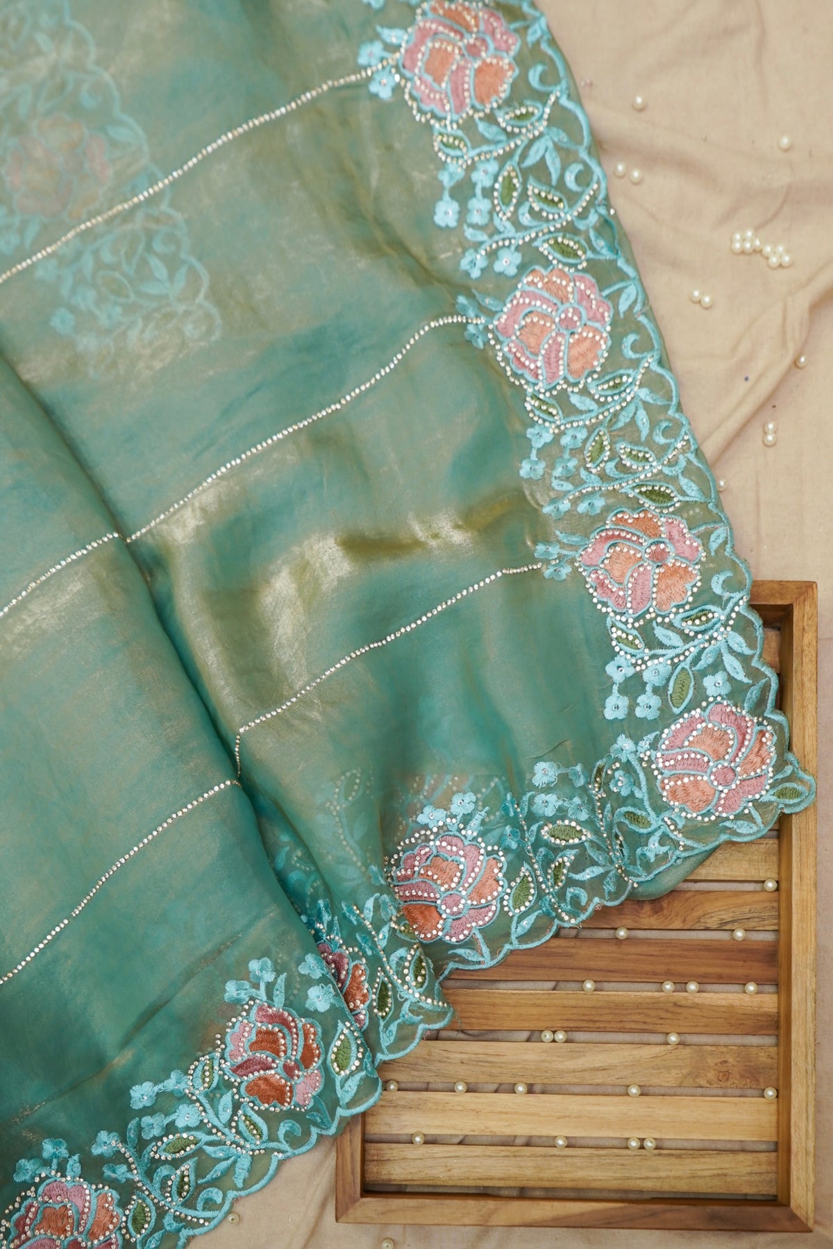 Aqua Blue Camellia Bloom Designer Tissue Saree with Rhinestone