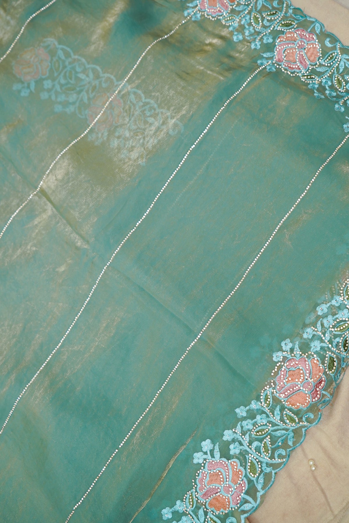Aqua Blue Camellia Bloom Designer Tissue Saree with Rhinestone