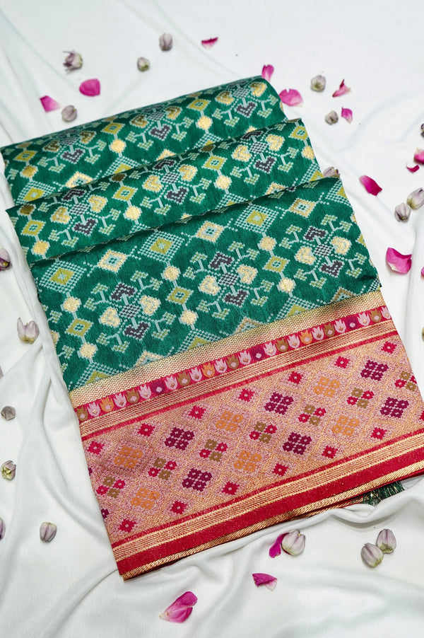 Bottle Green Ikkat Patola Silk Saree with Blush Pink Border