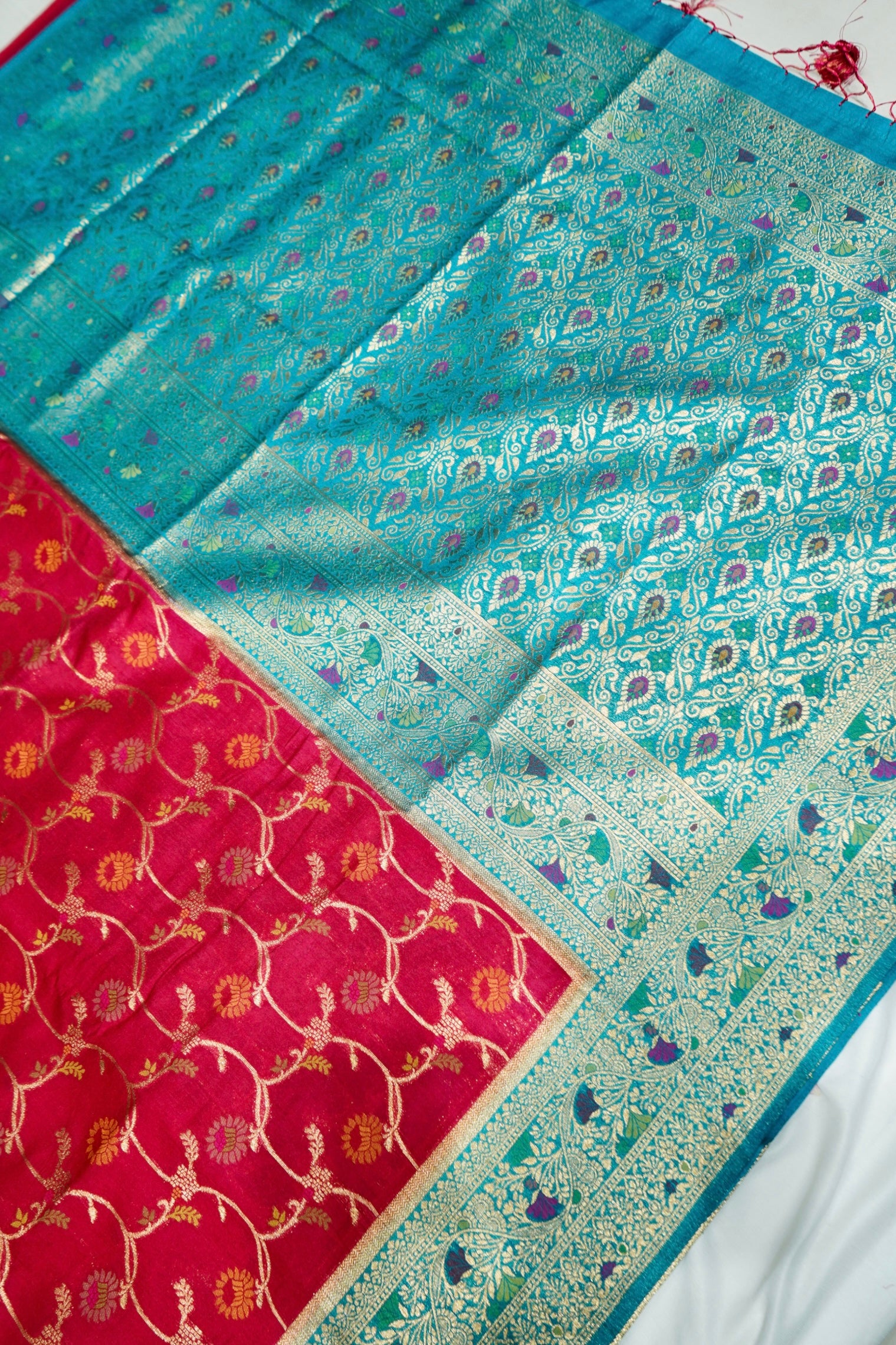 Ruby Pink Ikkat Patola Silk Saree with Turquoise Blue Border