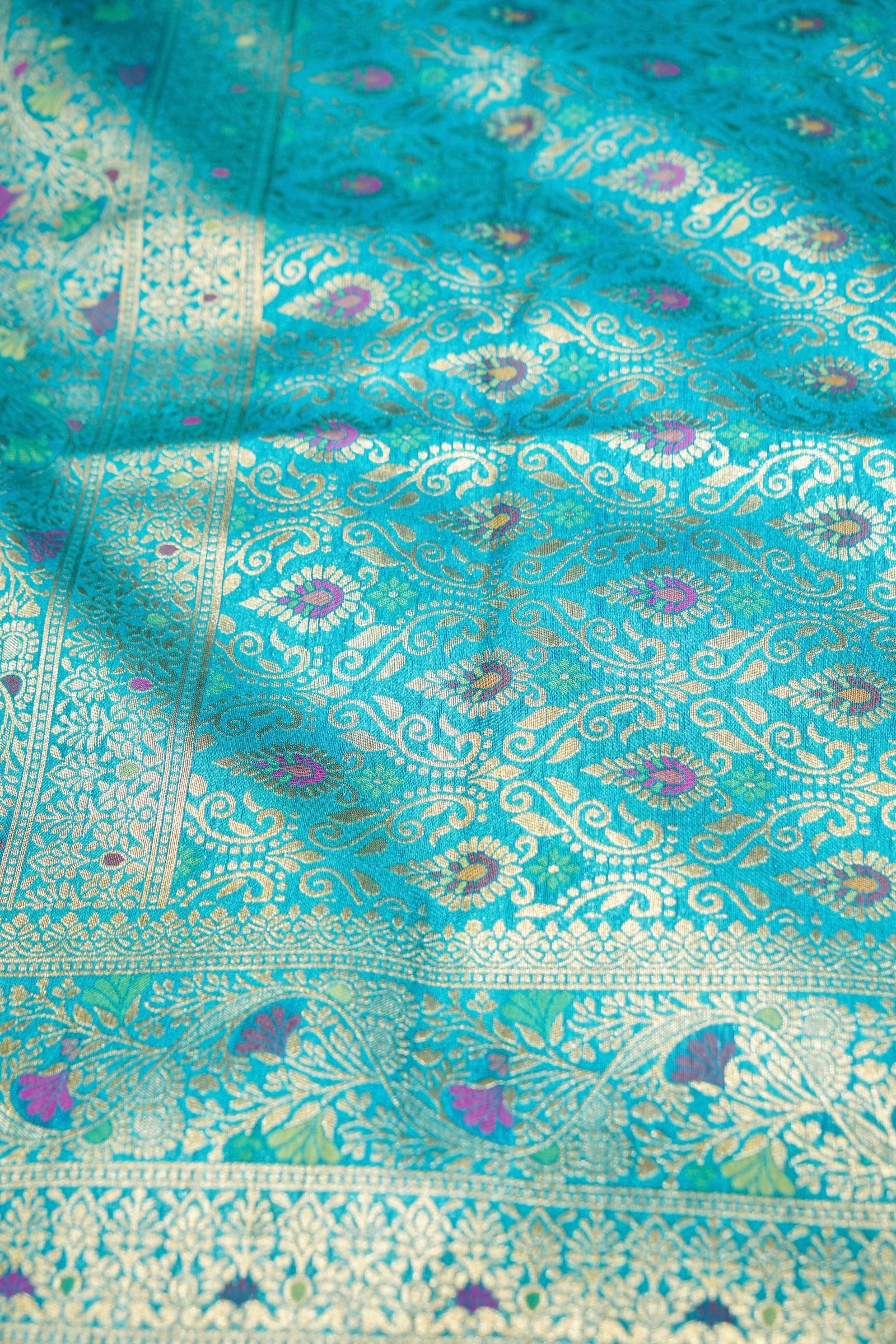 Ruby Pink Ikkat Patola Silk Saree with Turquoise Blue Border