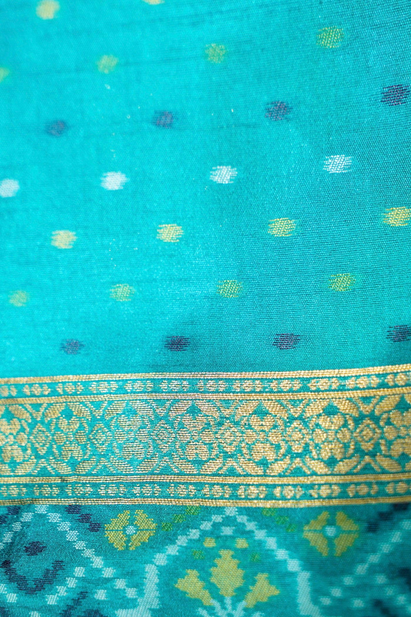 Wine Purple Ikkat Patola Silk Saree with Turquoise Blue Border
